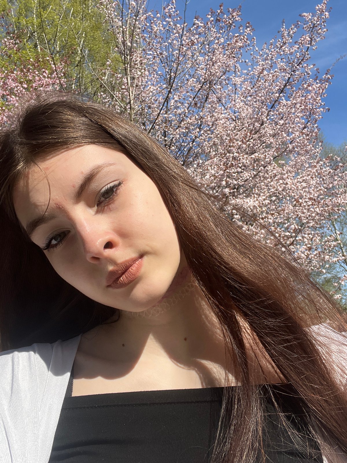 Young woman photographed with serene expression in Russia