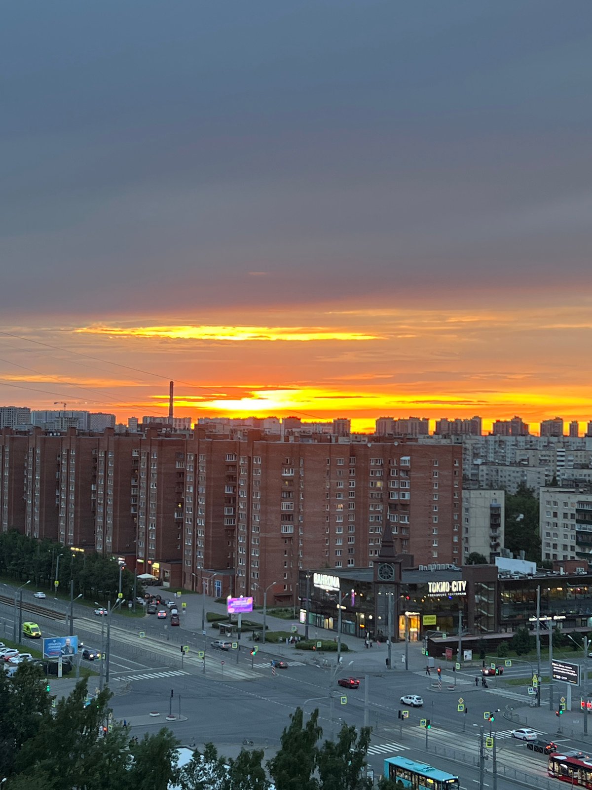 City at golden hour, rooftops to intersections