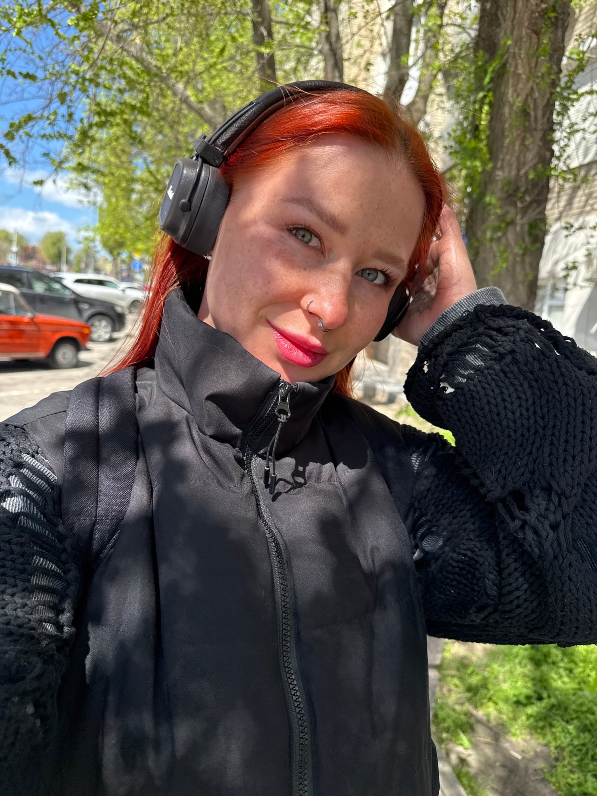 Woman documents morning walk through Rostov-on-Don with selfies, street photos
