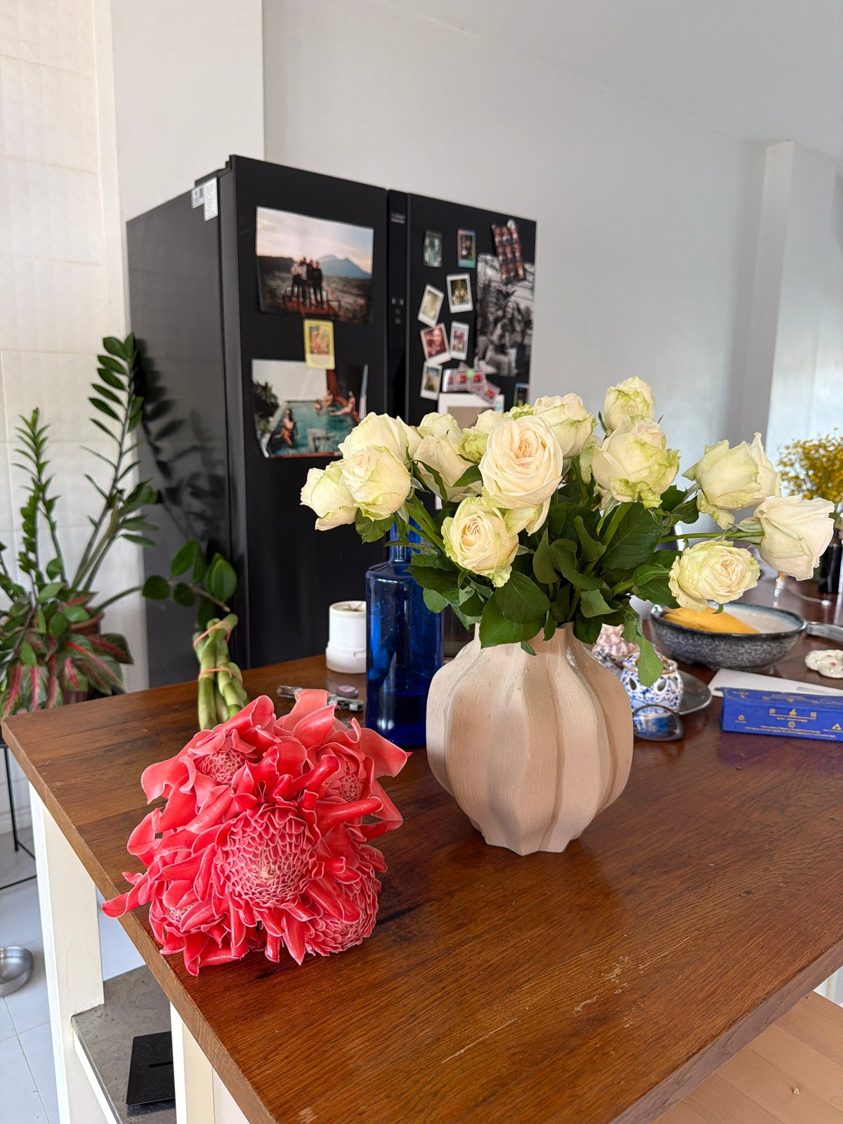 Flower arranging at home in Chang Phueak, tropical blooms on display