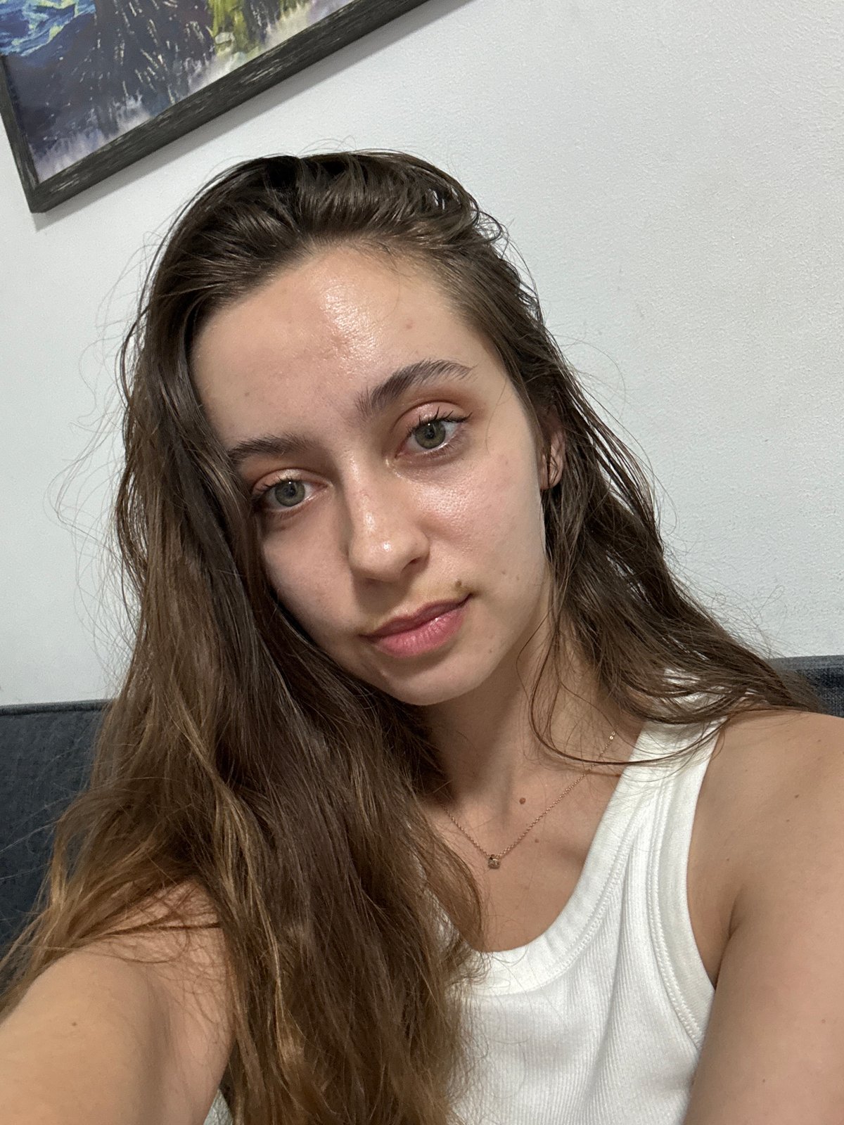 Woman takes selfie in Ramat Gan apartment