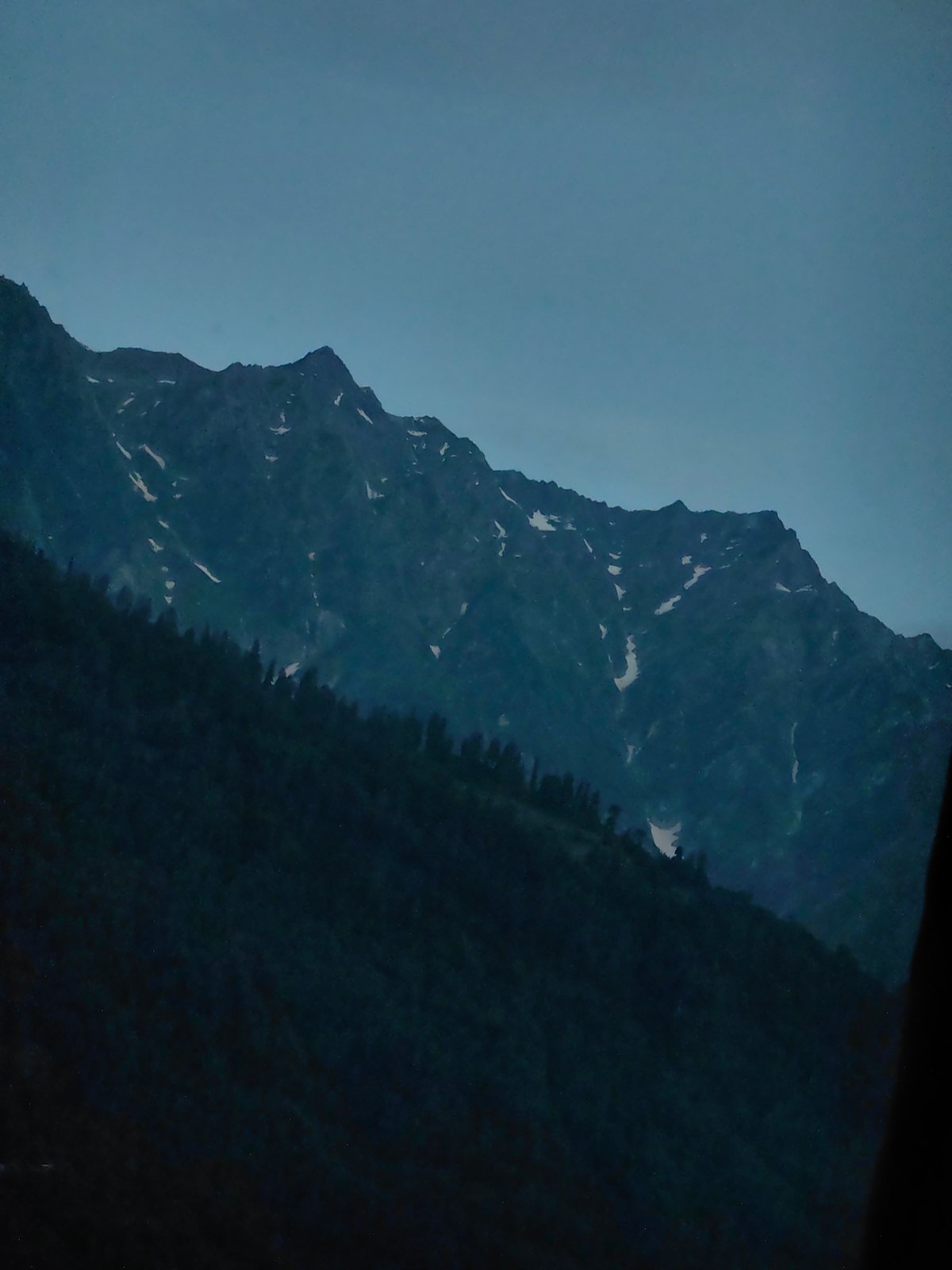 Dusk settling over the mountain ranges near Vashisht