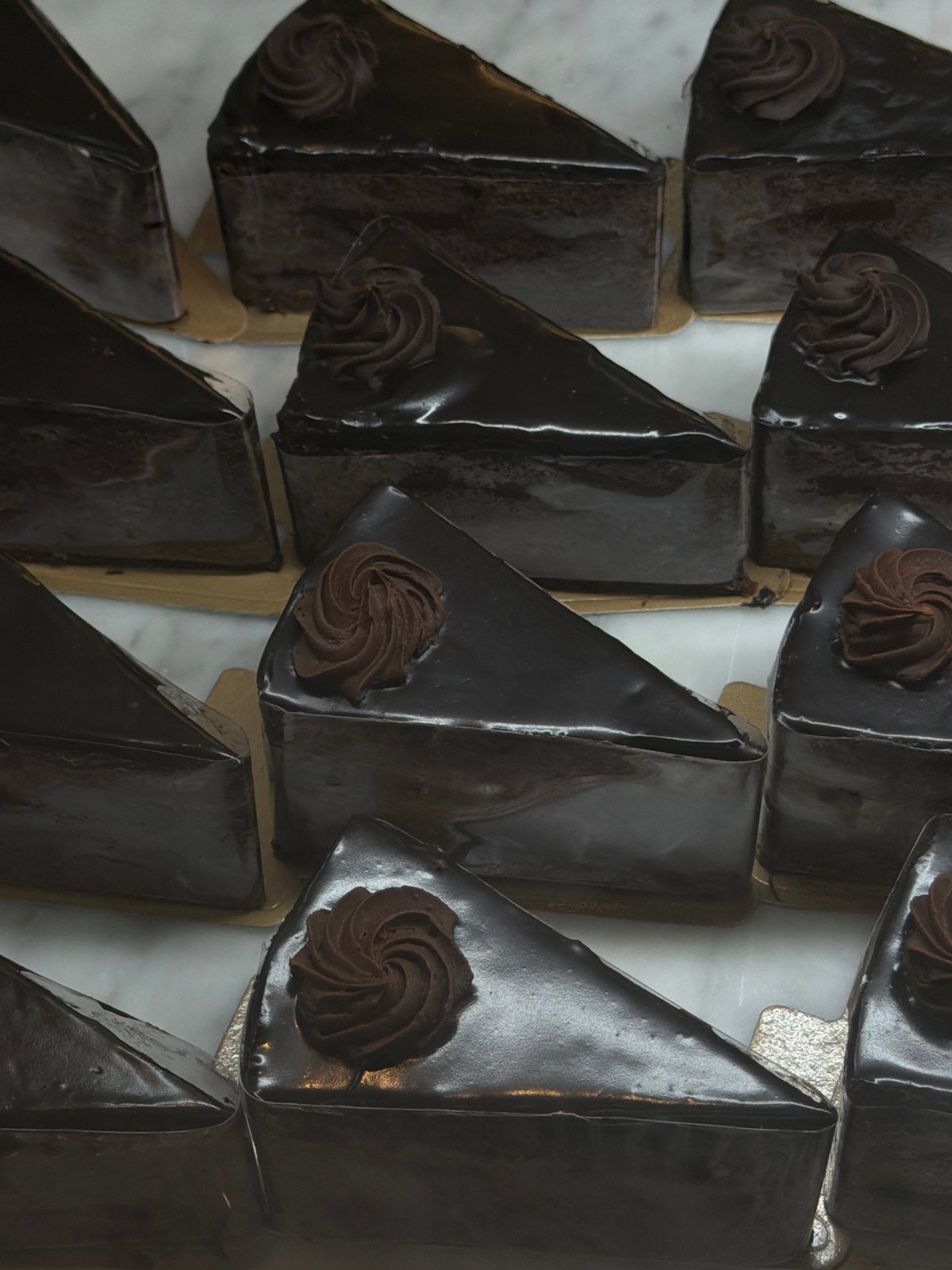 Bakery dessert display documented in North Kuta, Indonesia
