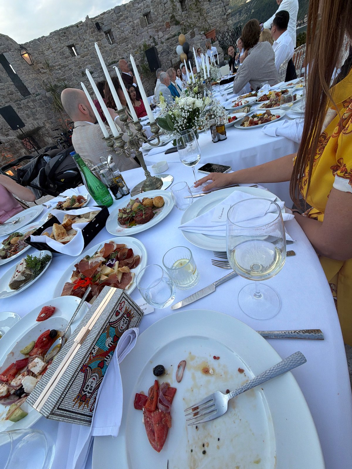 Outdoor dinner party observed at undisclosed location