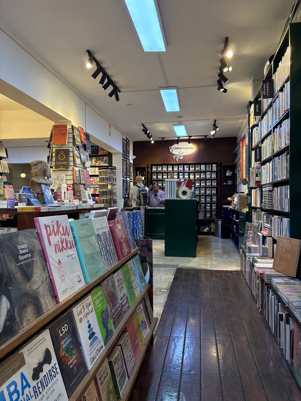 Inside a San Isidro bookstore with a striking metal sculpture