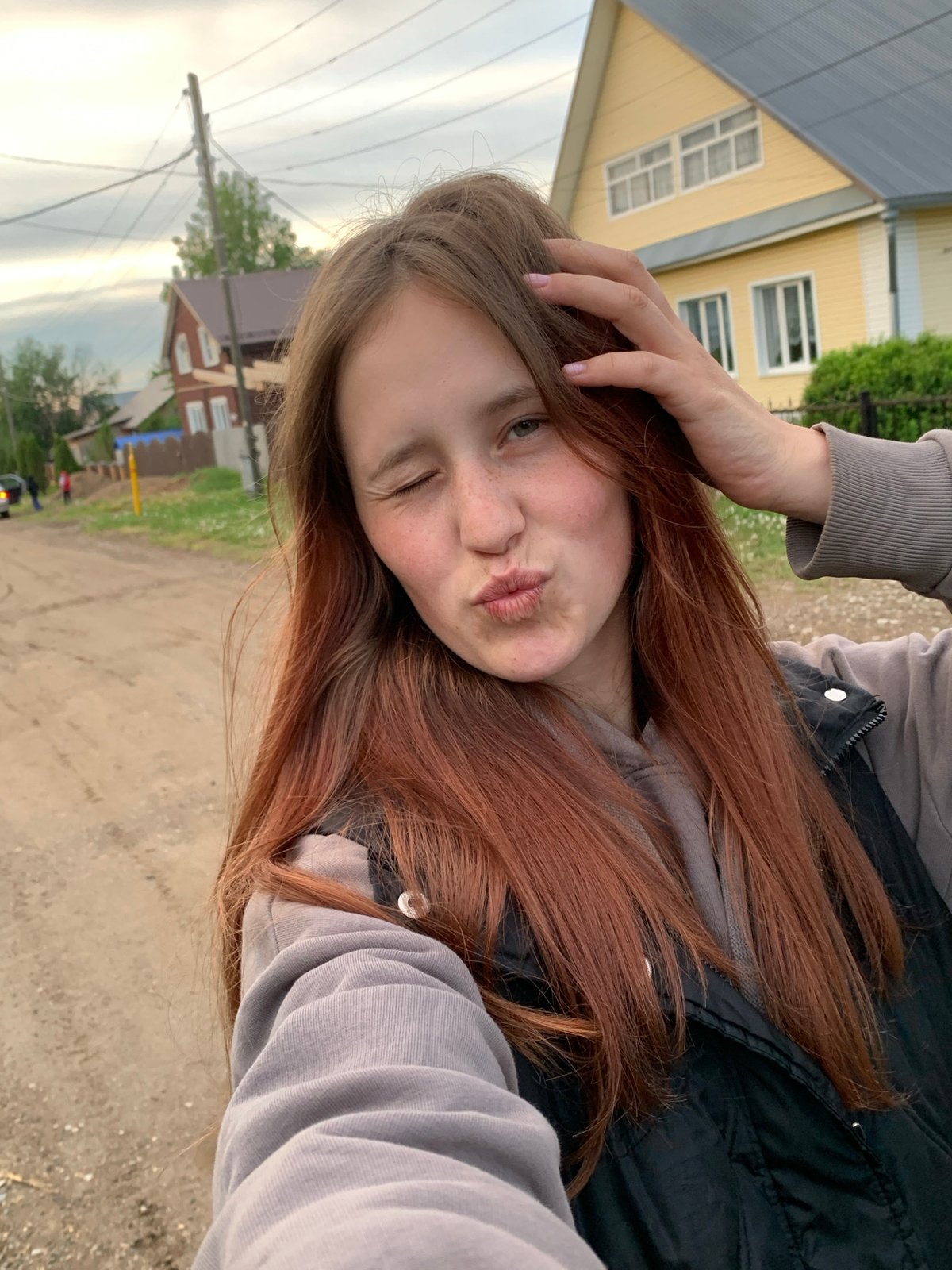 Woman documents afternoon with selfies across Russian village