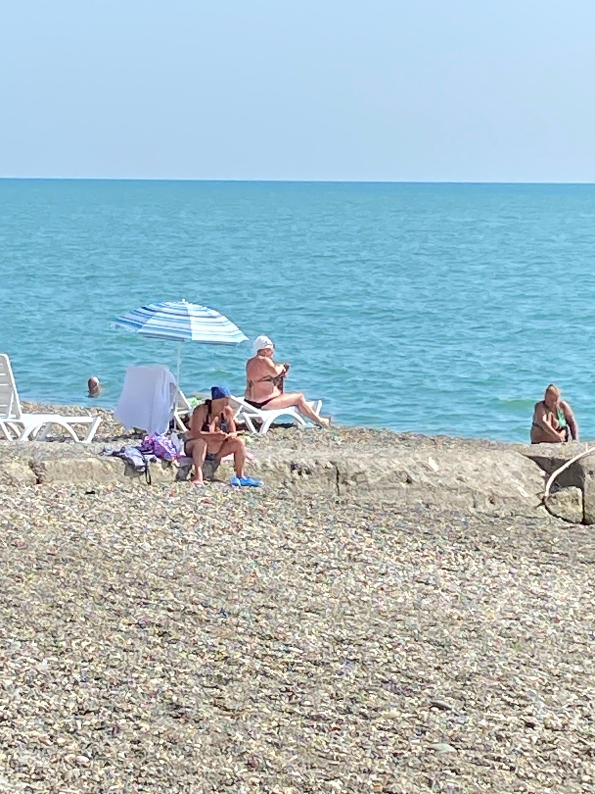Pebble beach and park strolls on a summer afternoon in Abkhazia
