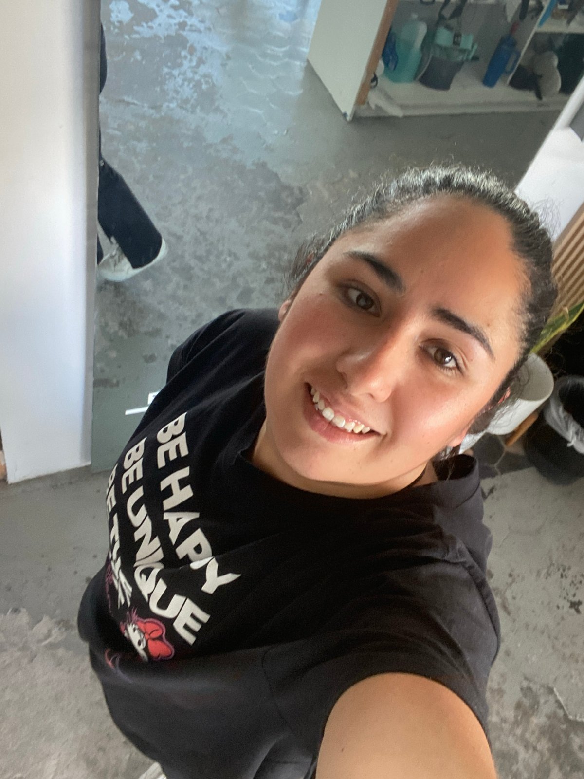 Woman takes selfies at Puebla gym facility