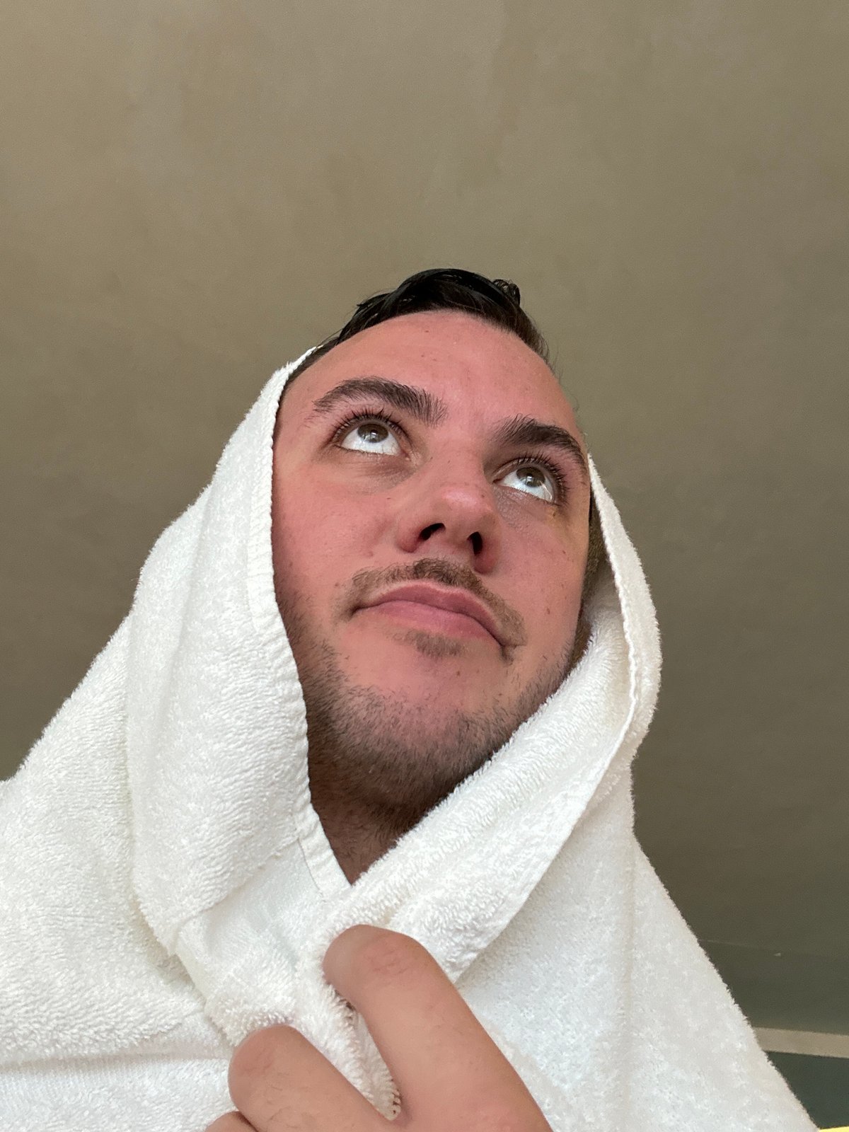Post-shower moment captured in close-up photograph in London