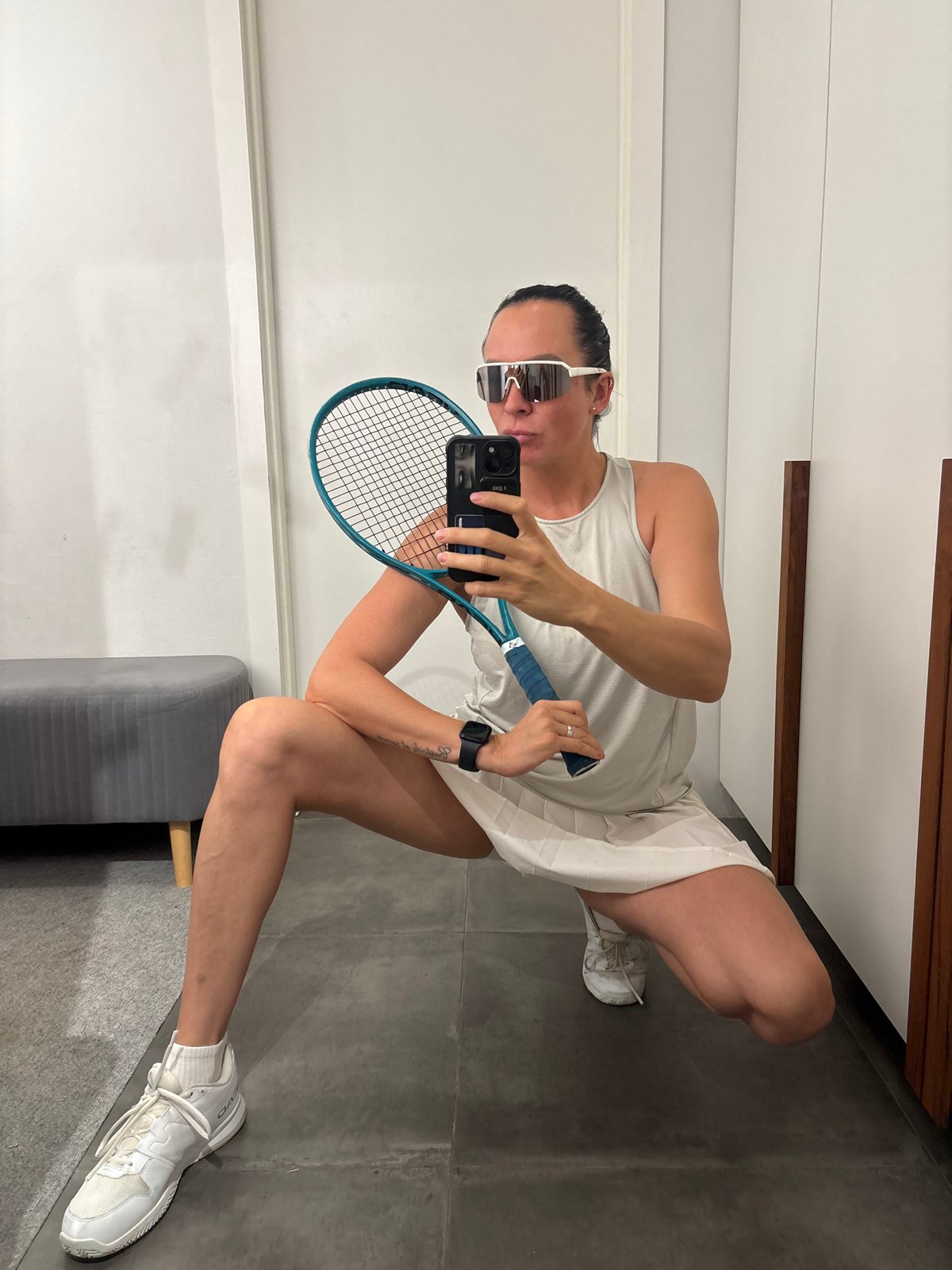 Woman documents tennis outing with selfies in Chaikovsky