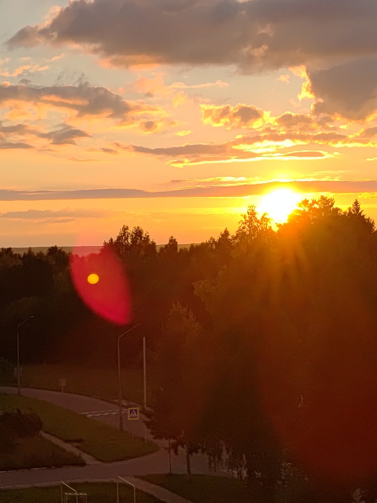 Sunset over a quiet suburban evening in Markovskiy, Russia