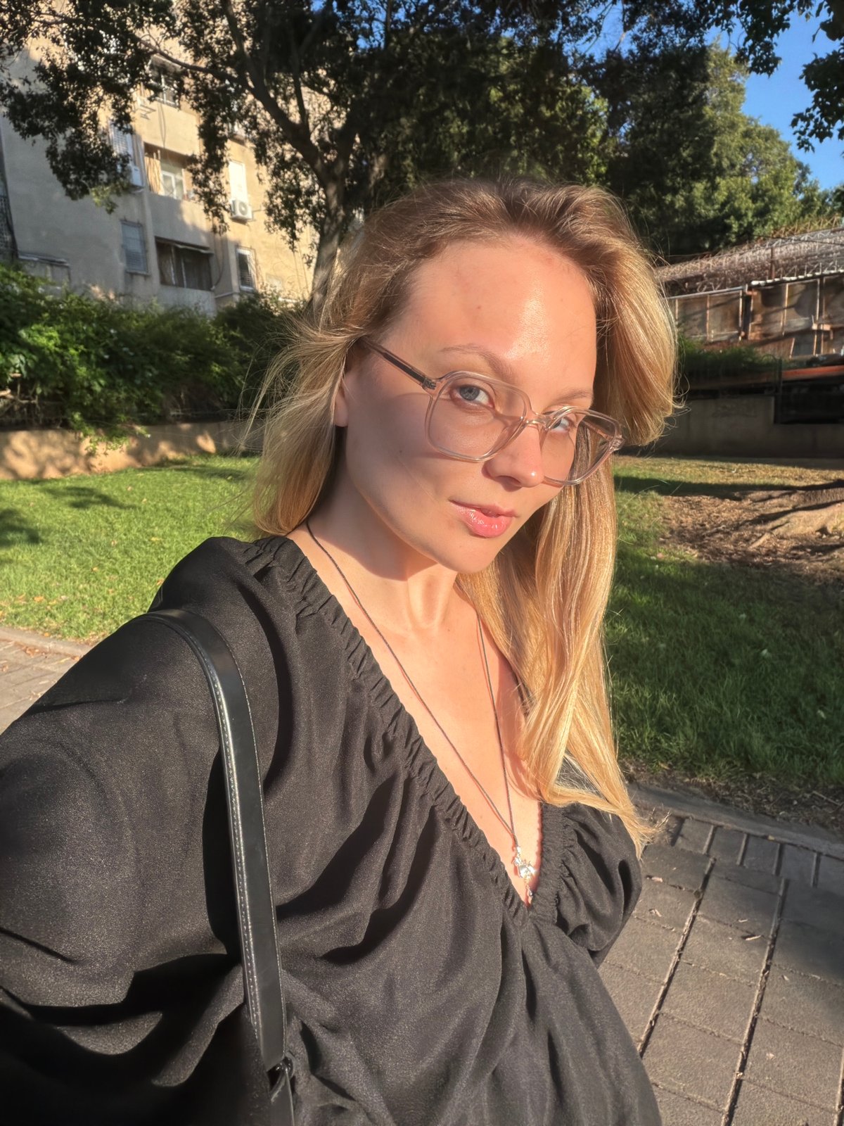 Woman takes rotated selfie in Bat Yam, Israel