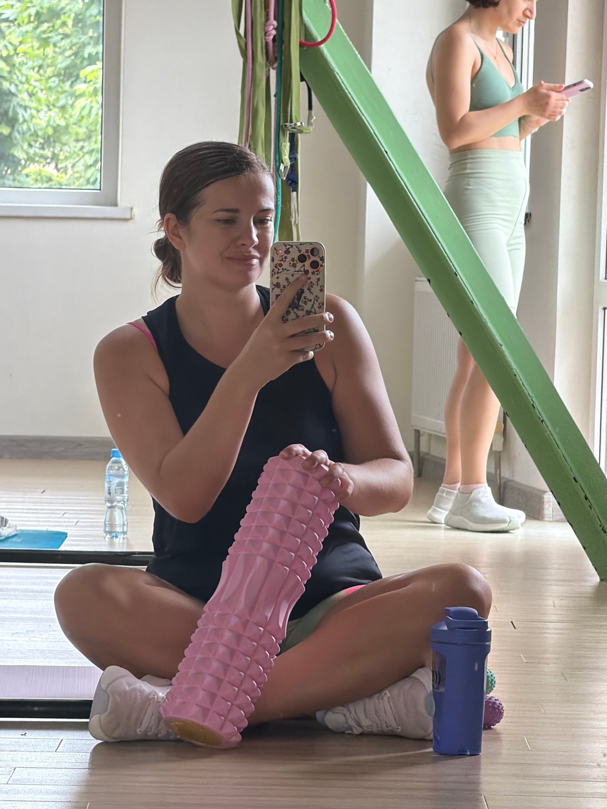 Post-workout selfie with a foam roller in a Sochi gym
