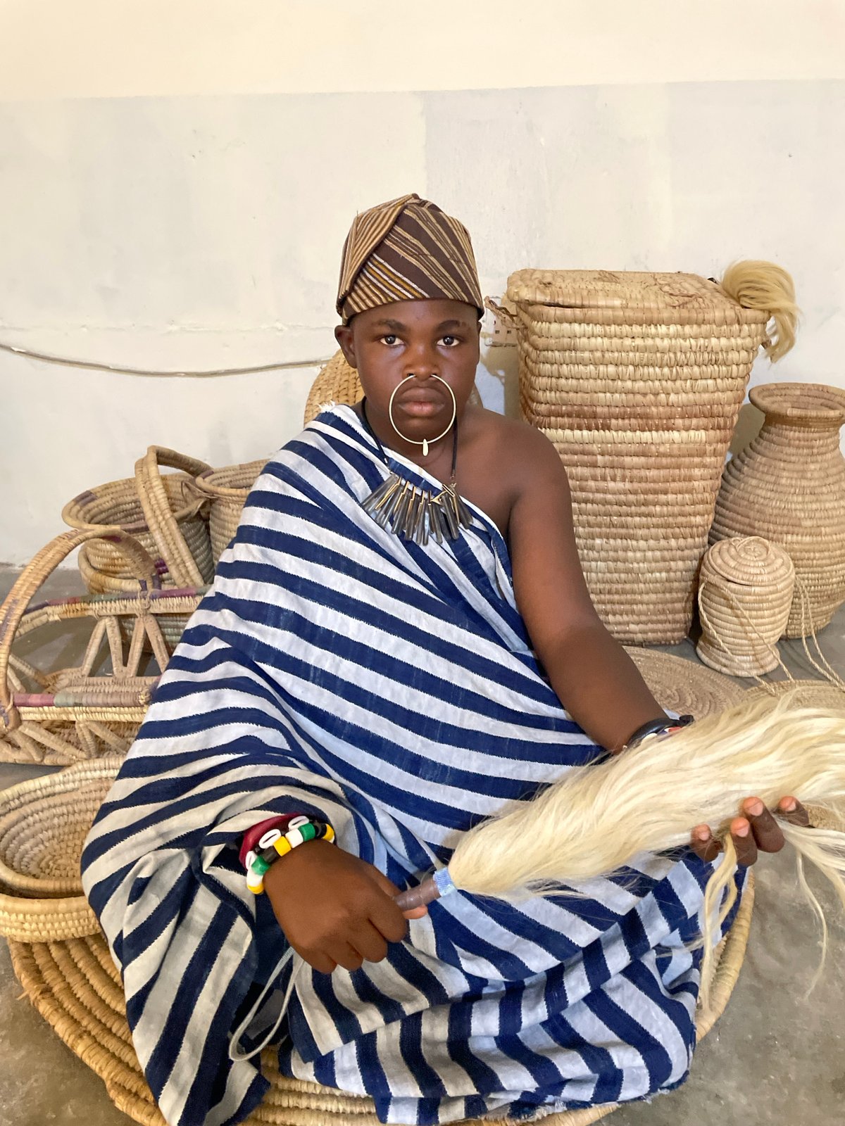 Traditional attire photoshoot captured in Jos craft market setting