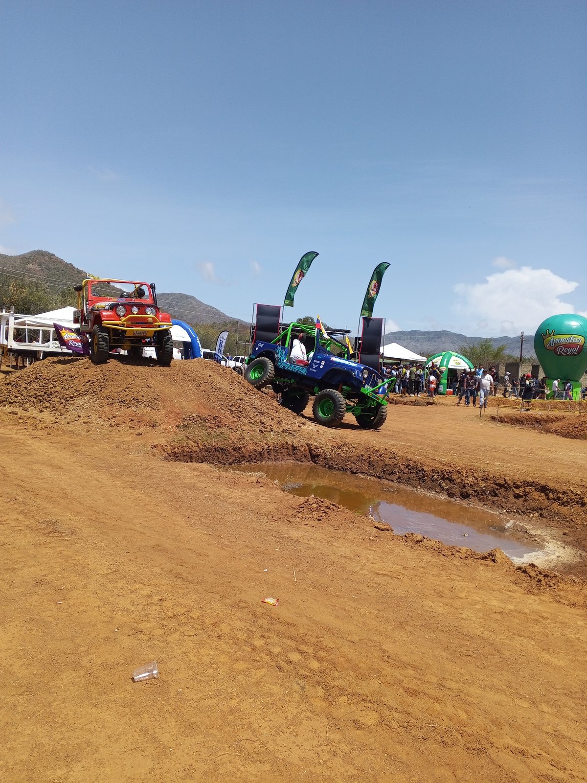 Off-road vehicle competition features modified Jeeps on dirt courses