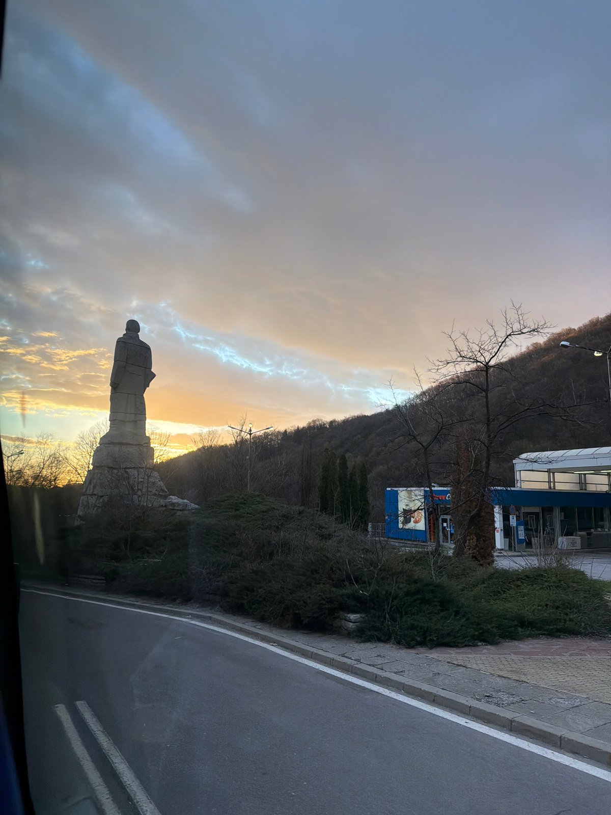 Dawn landscape with statue photographed in Sofia, Bulgaria