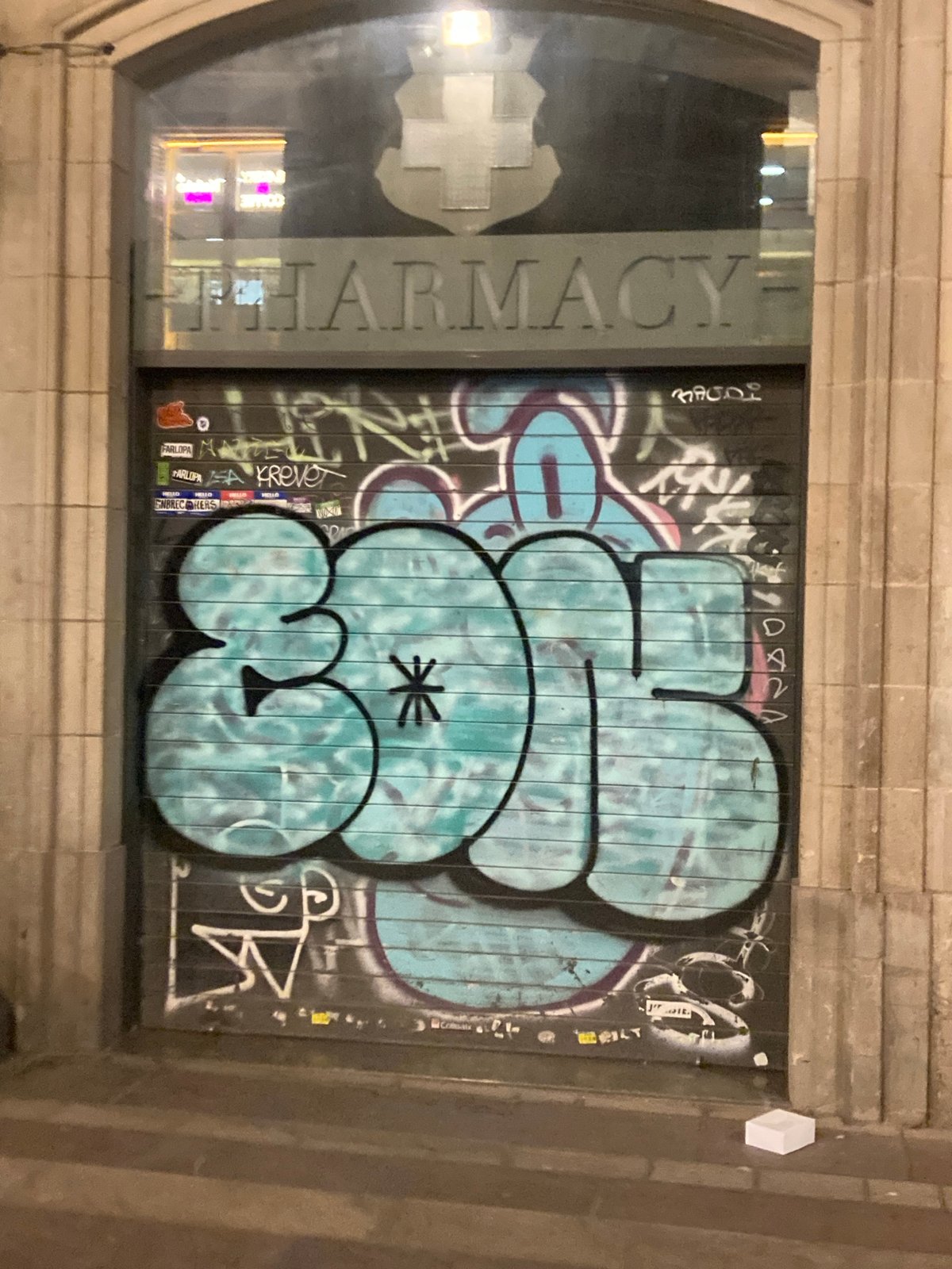 Barcelona alleyways after dark, wall-to-wall street art