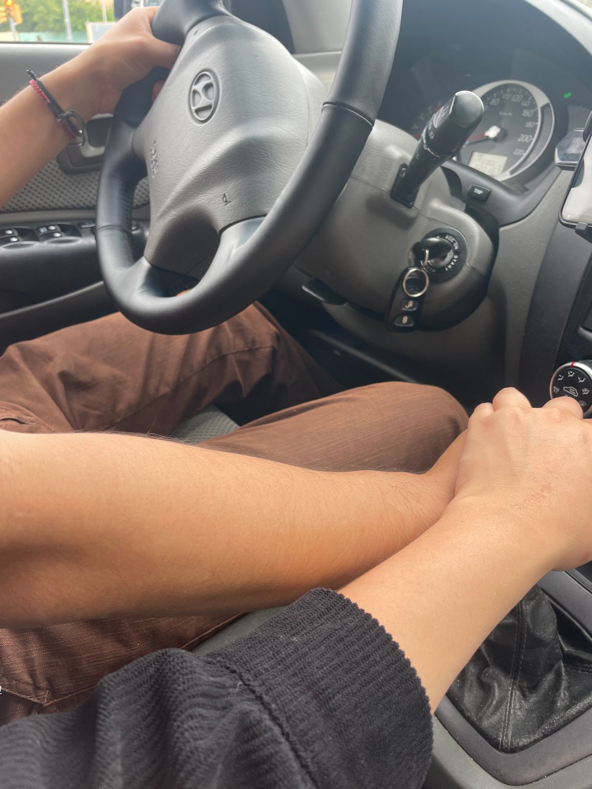 Two people share moment in car in l'Hospitalet de Llobregat