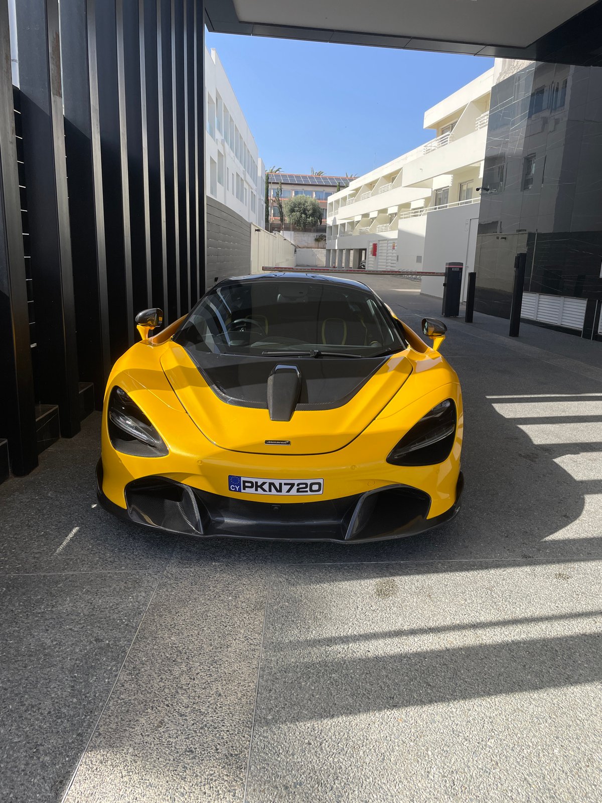 Yellow McLaren draws attention from local boys in Ayia Napa