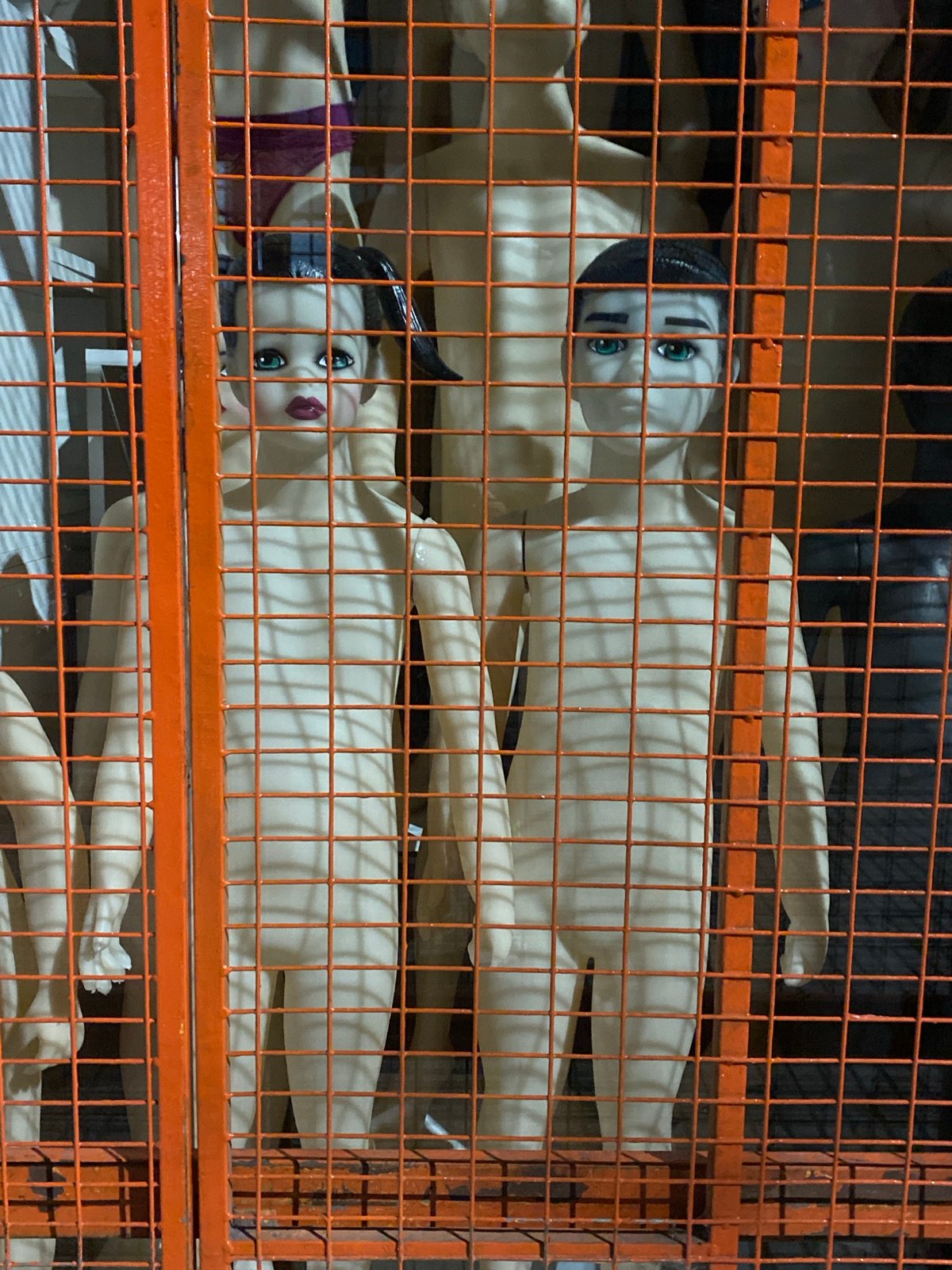 Morning street scenes captured in Buenos Aires include mannequins, commuter
