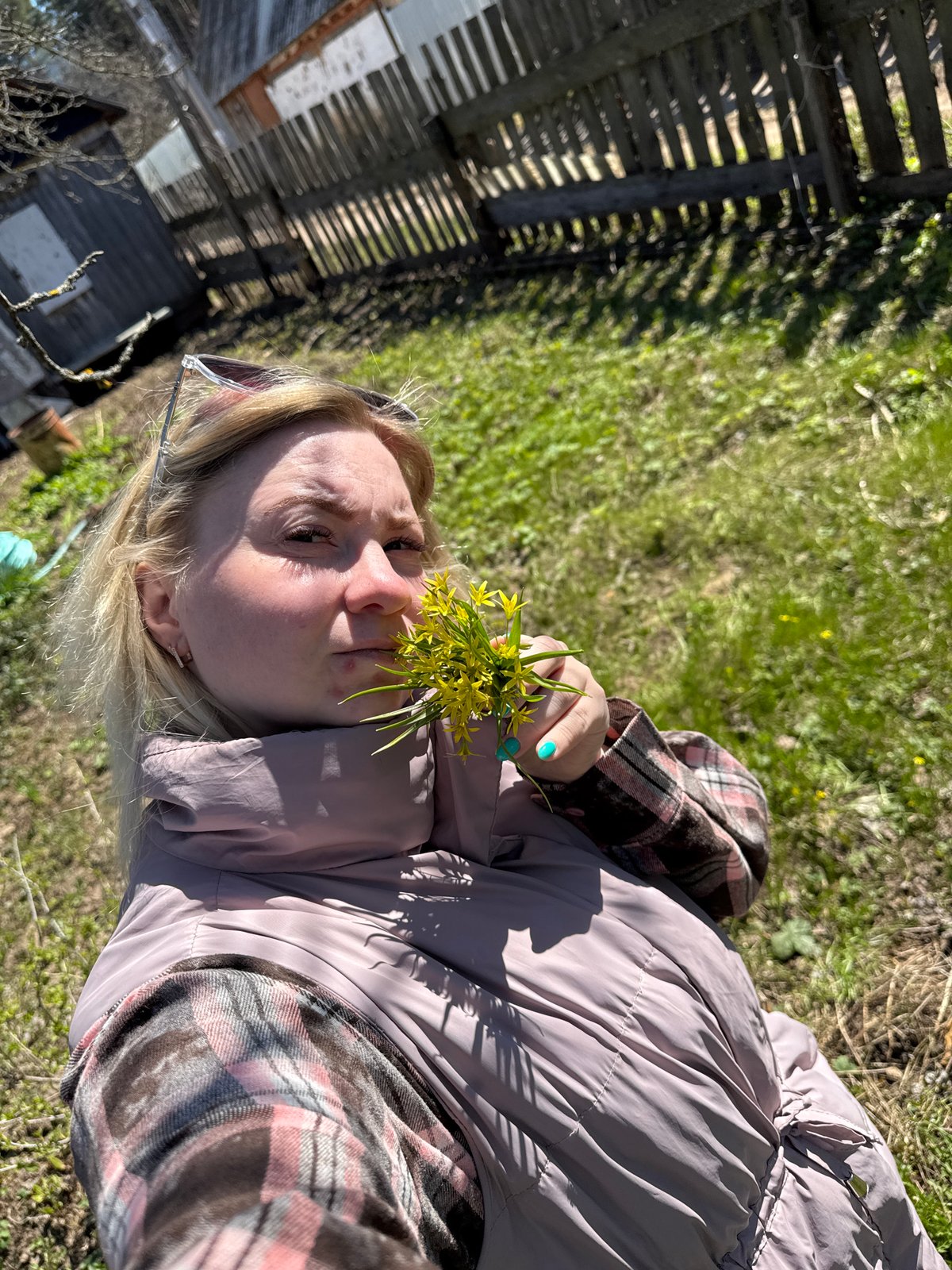 Woman enjoys spring morning outdoors in Chaikovsky, Russia