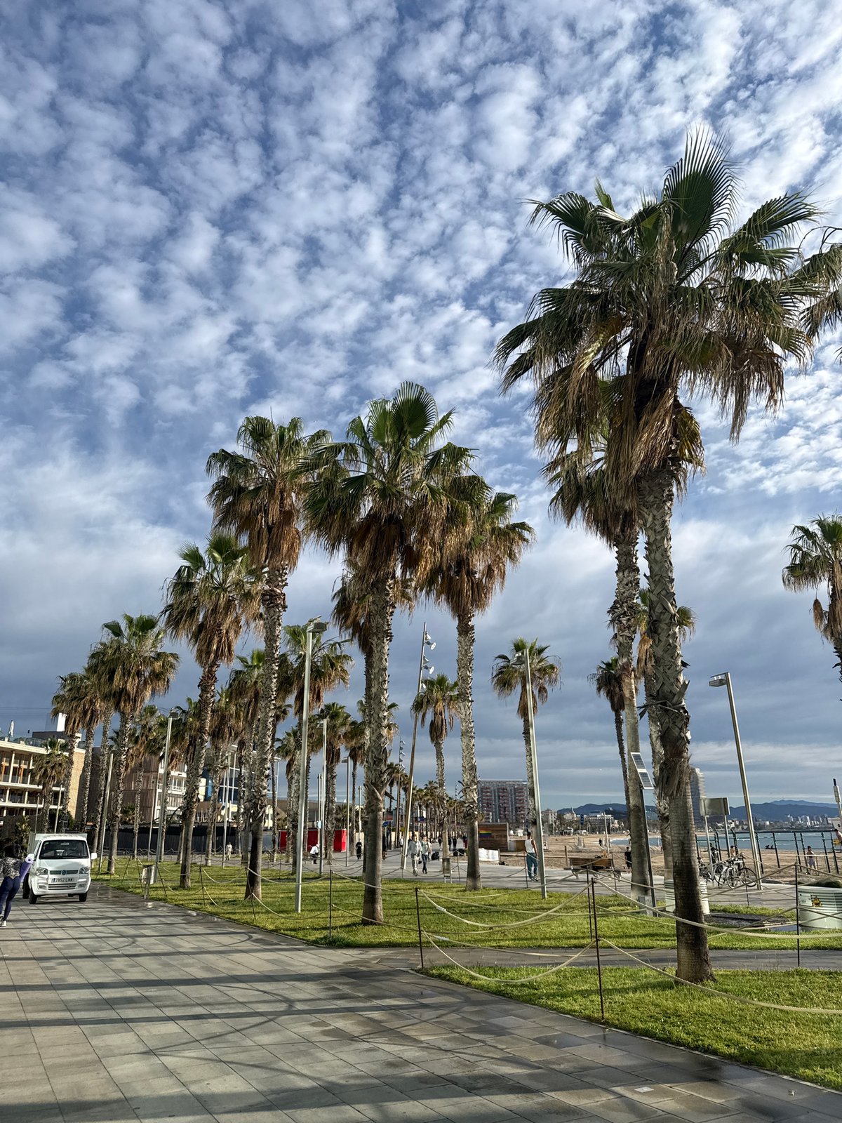 Morning scenes captured along Barcelona's Barceloneta Beach walkways