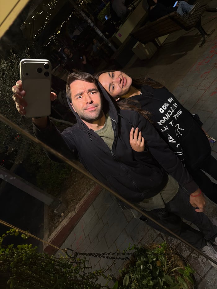 Couple's evening date documented across Tel Aviv locations