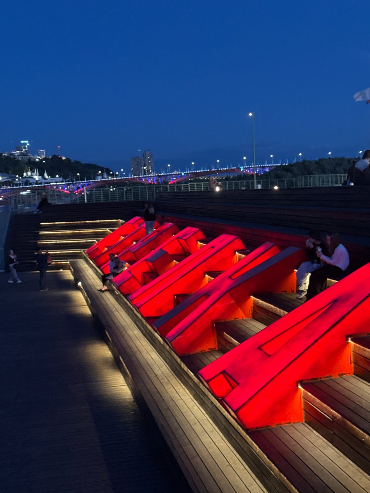 Nizhny Novgorod embankment at dusk, Volga landmarks lit up