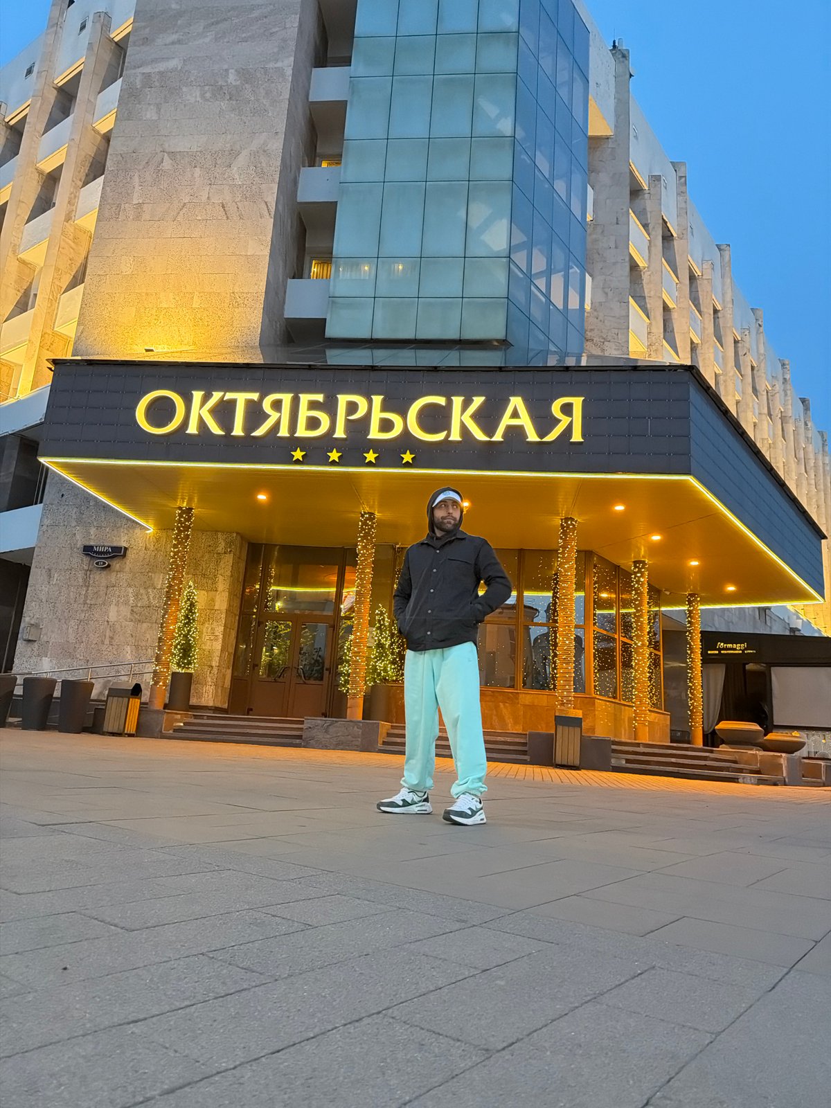 Man with phone, Coke spotted outside Krasnoyarsk hotel