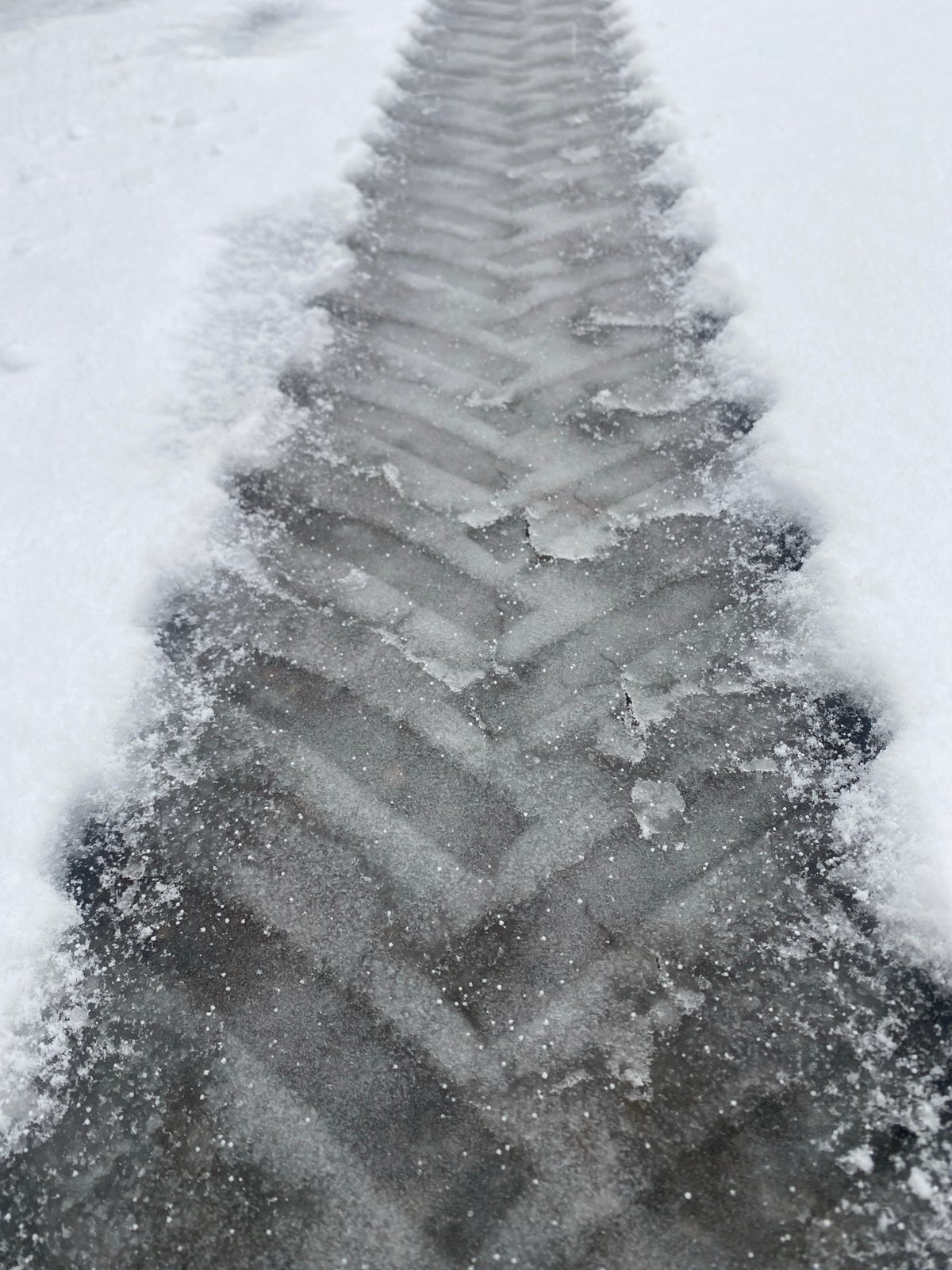 Snowy conditions documented in Prikamsky, Russia with damaged infrastructure