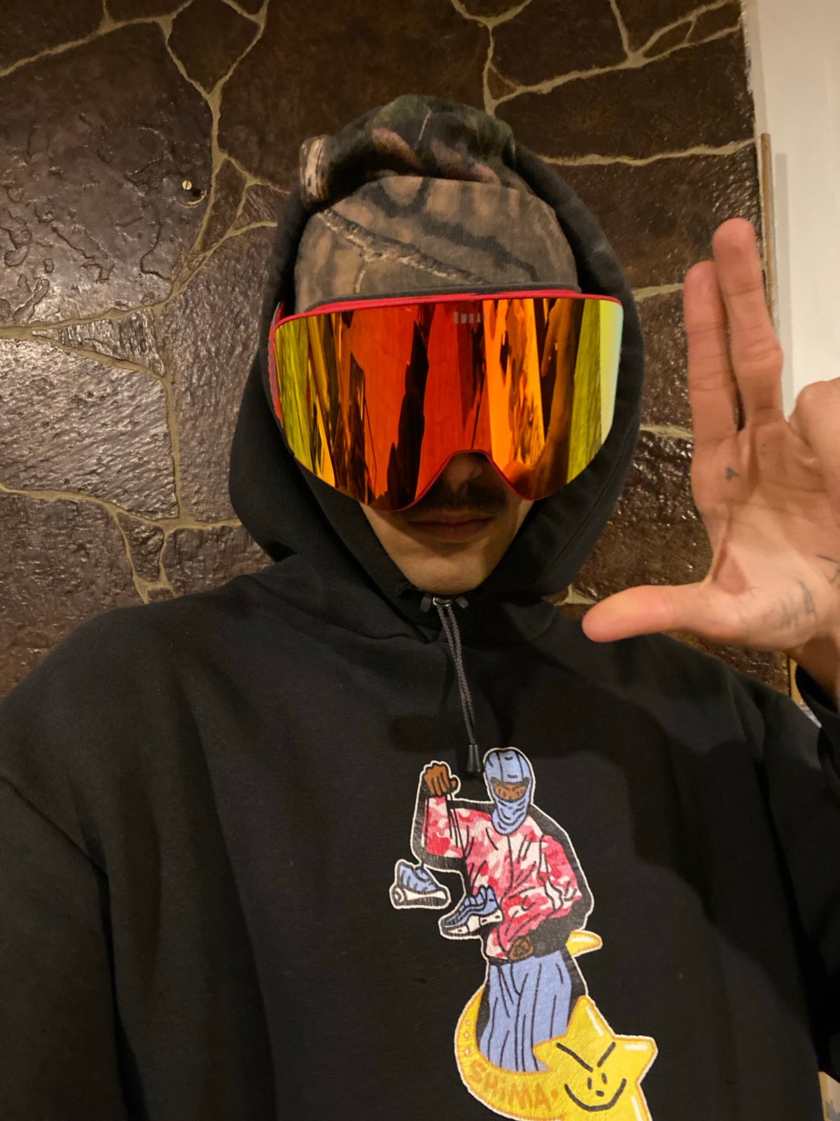 Person photographed indoors wearing distinctive clothing in Ushuaia, Argentina