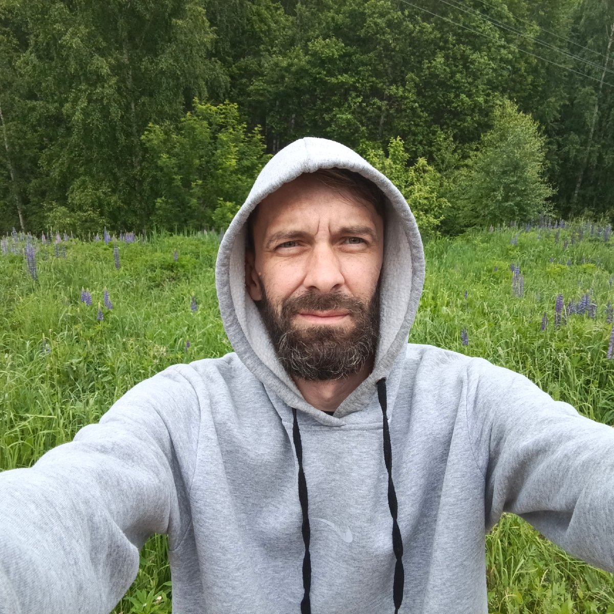 Man takes selfies in Russian forest near Марковский