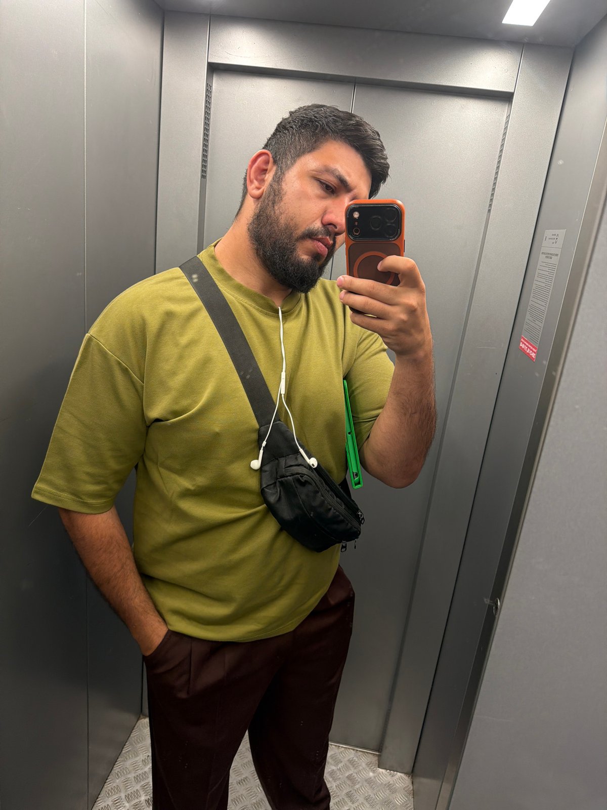 Person takes elevator selfie in Krasnoyarsk, Russia