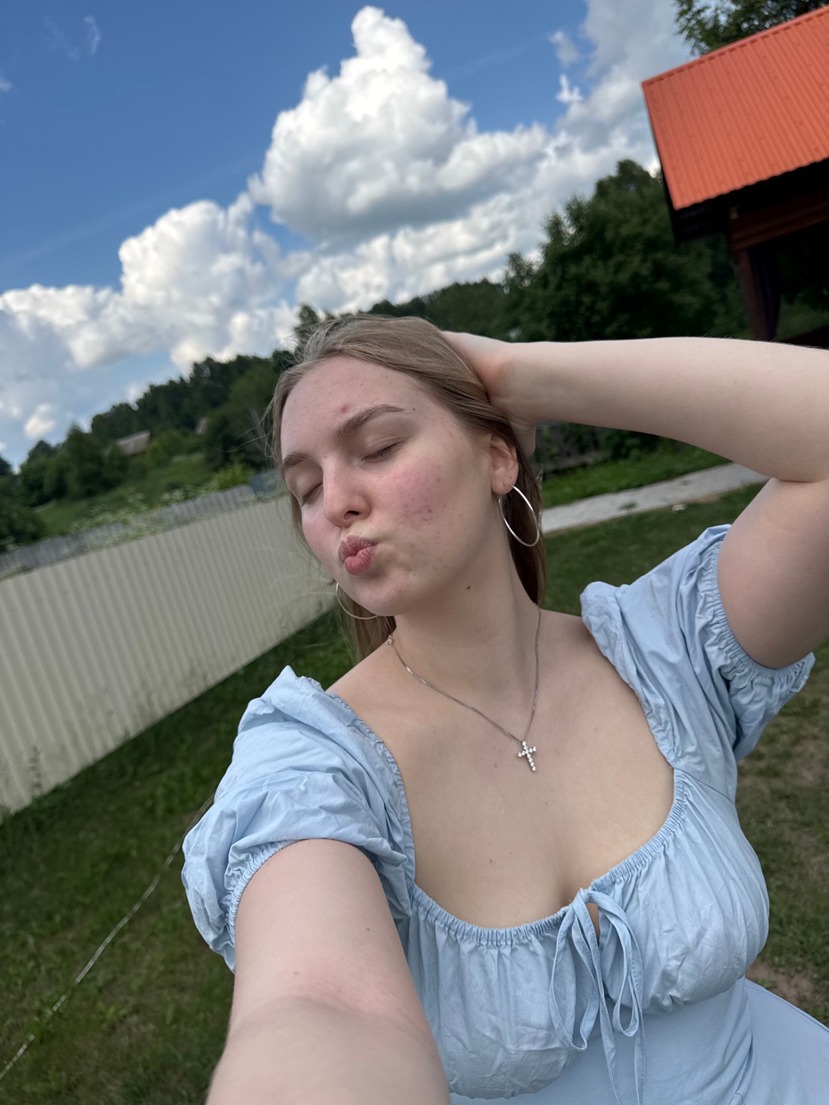 Outdoor selfie session in light blue dress, Russia