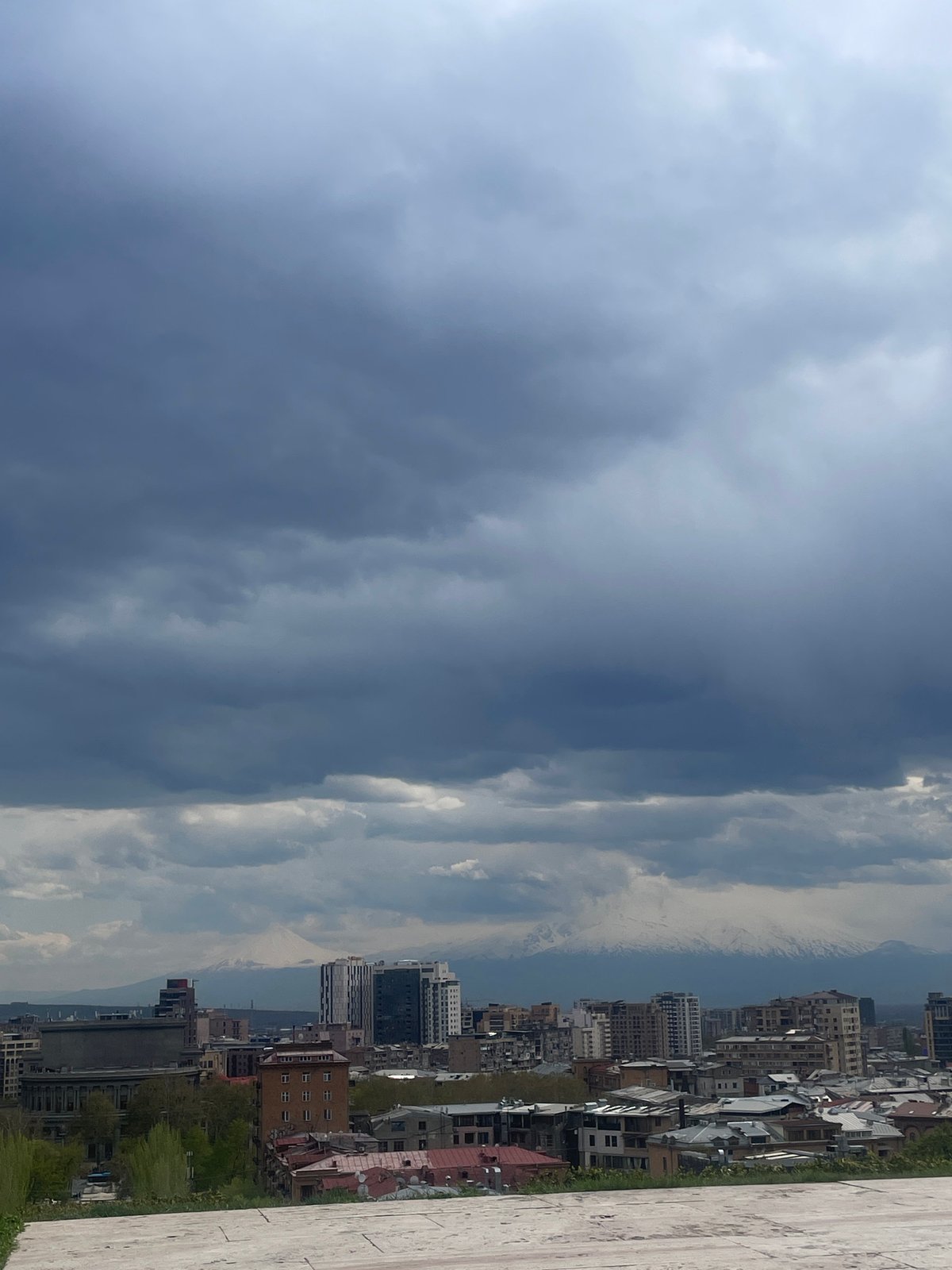 Dramatic skies captured over Yerevan cityscape from elevated viewpoint
