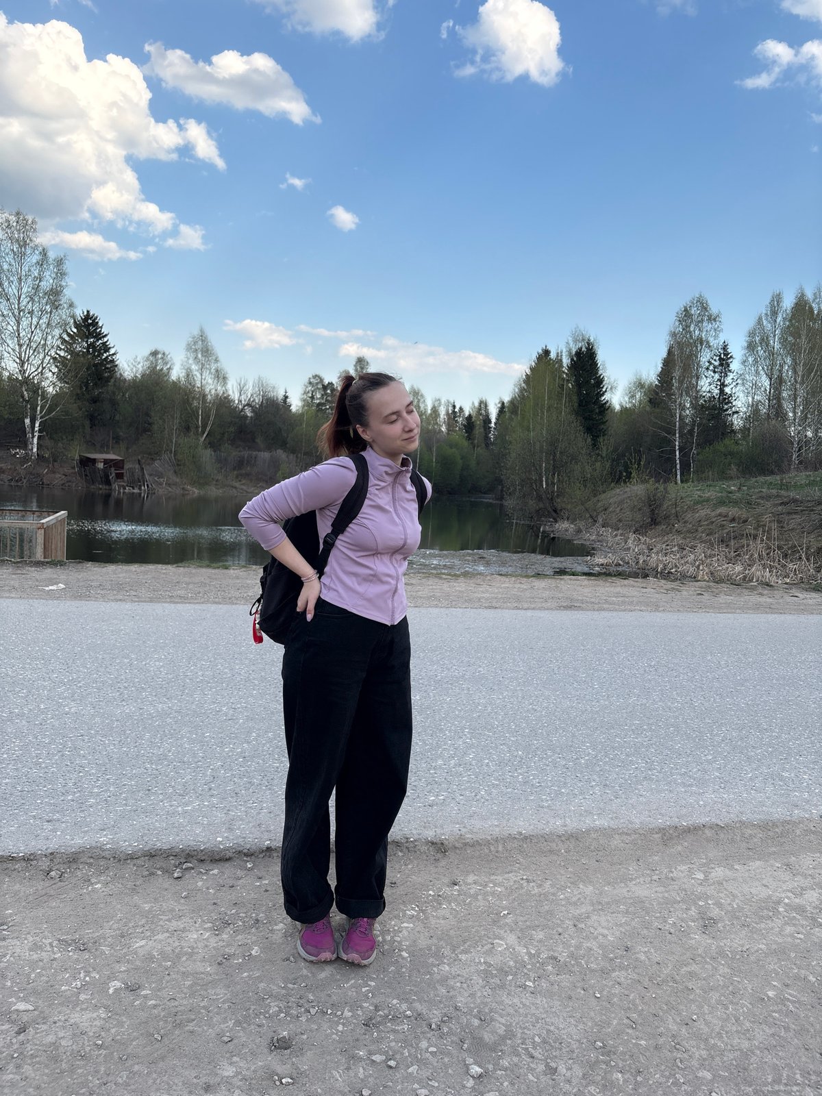 Woman walks through Perm, Russia during afternoon outing