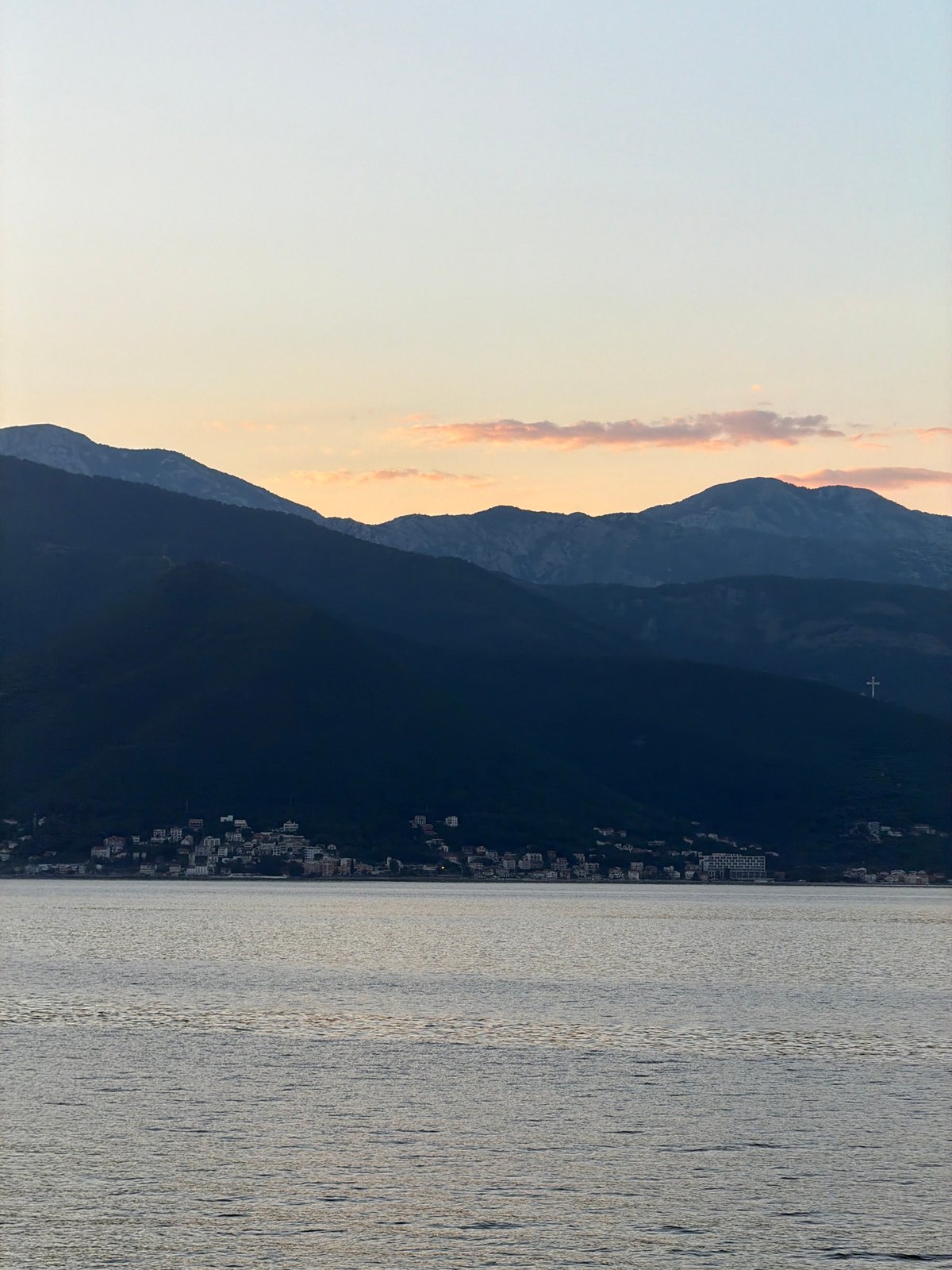 Sunset coastal views captured in Gošići, Montenegro terrace moment