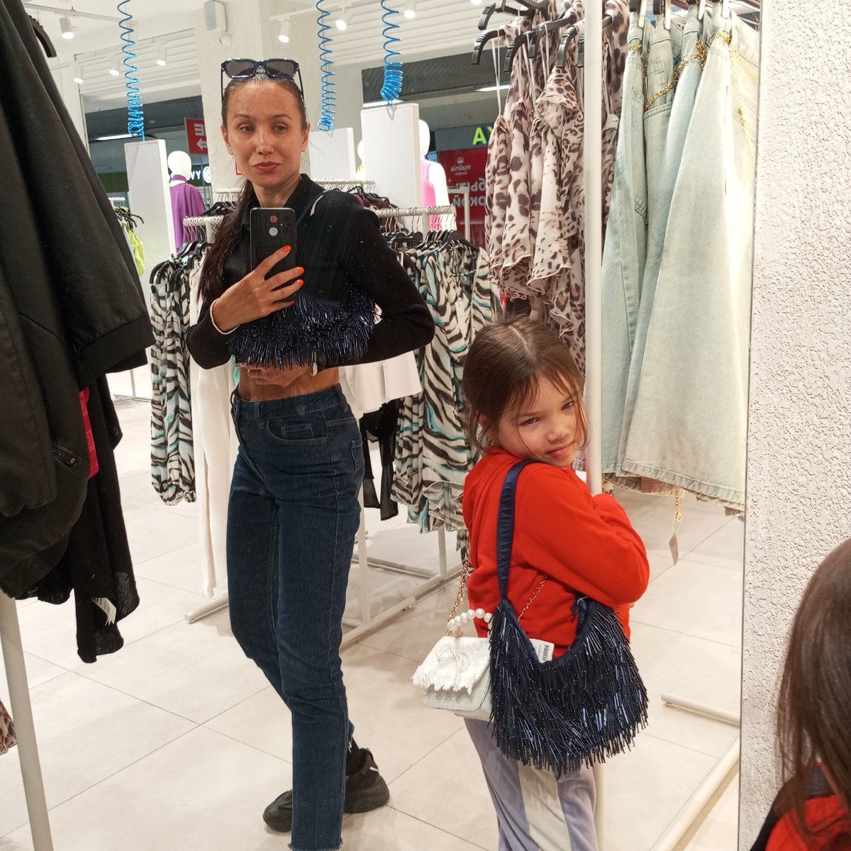 Mother and daughter shopping trip documented in Izhevsk mall