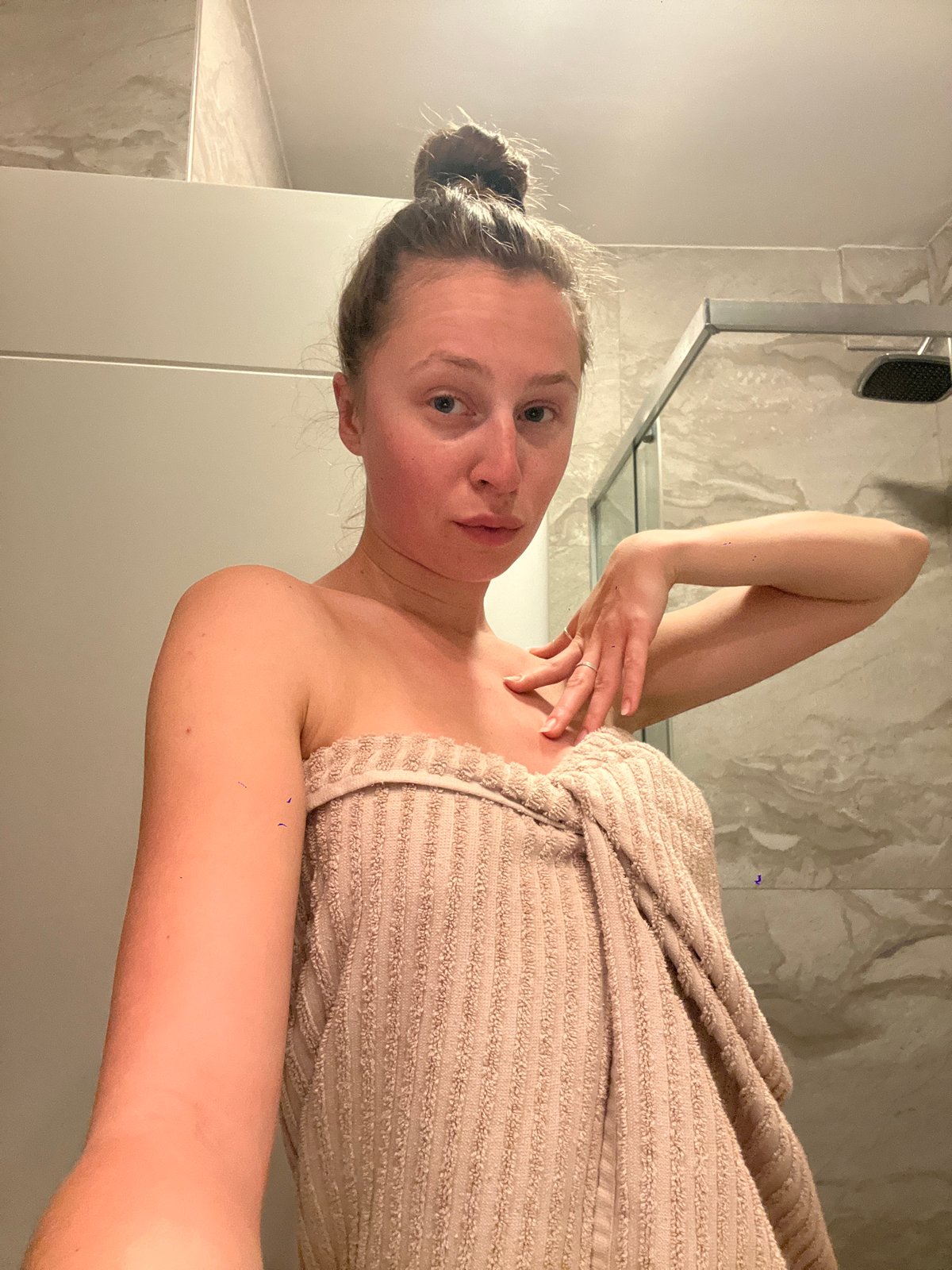 Woman observed in bathroom during morning routine in Montenegro