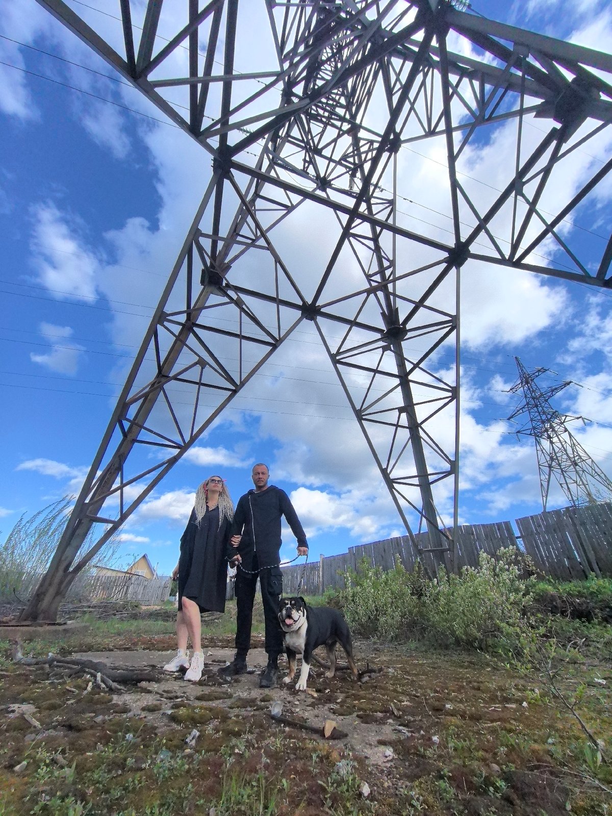 Couple with dog photographed near transmission towers in Noviy