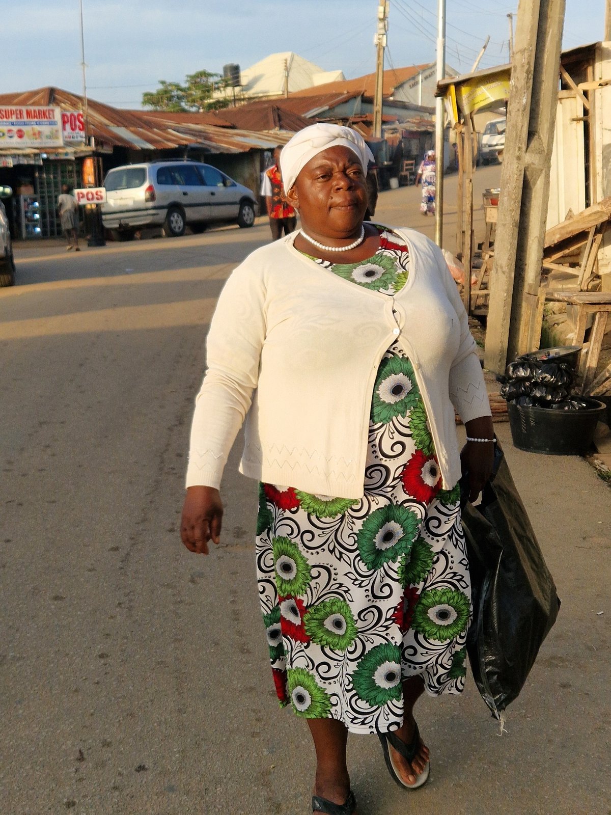 Morning street life and sunset skies in an African urban setting