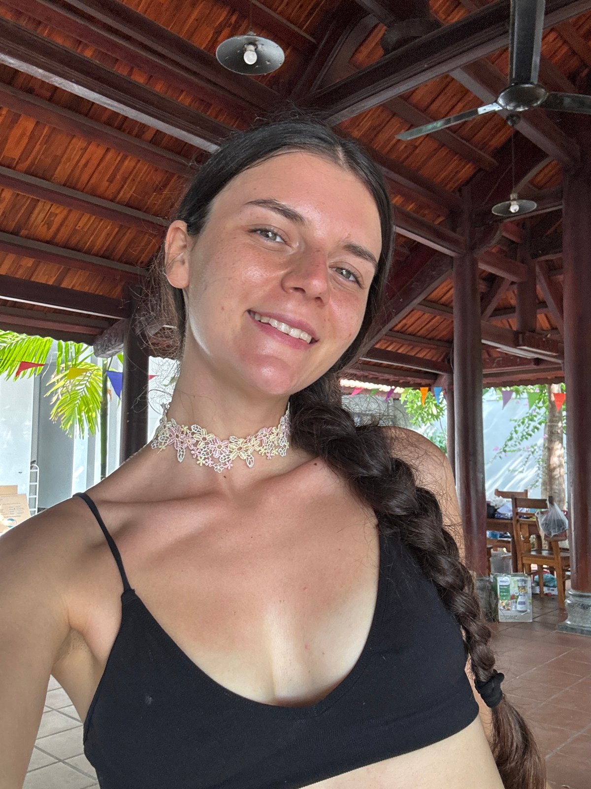 Woman photographed in casual portrait session in Mũi Né