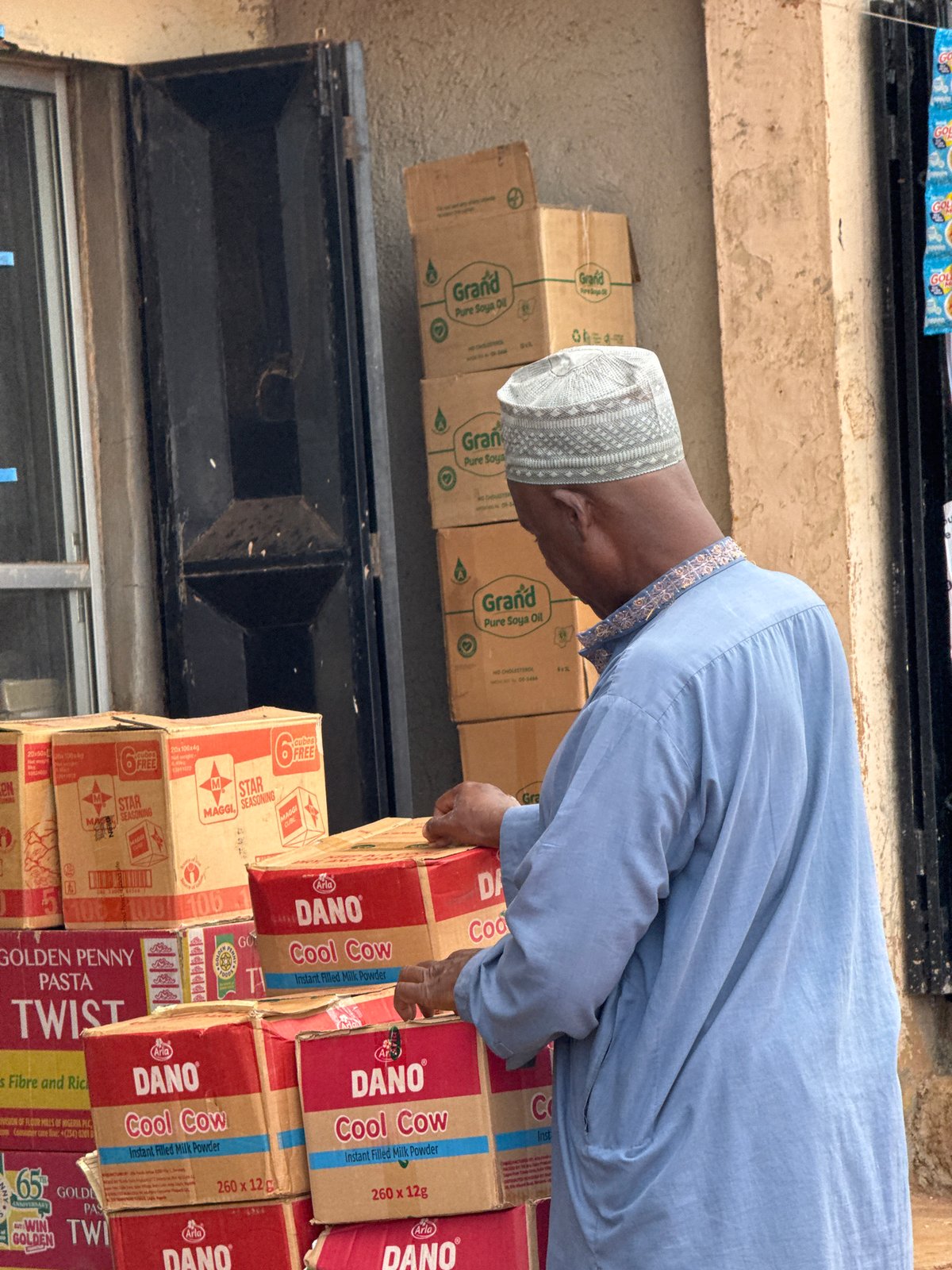 Midday street and market life in Jos, Nigeria