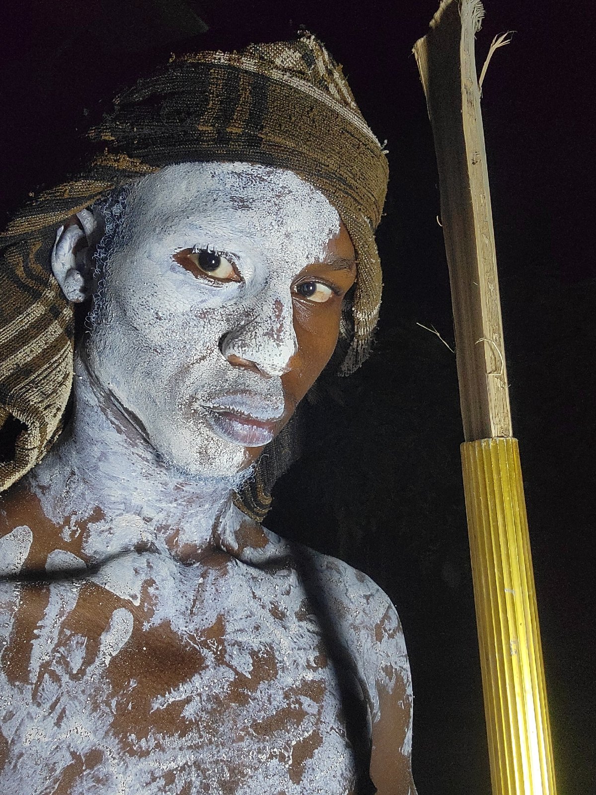 Traditional ceremony with white body paint documented in Onitsha