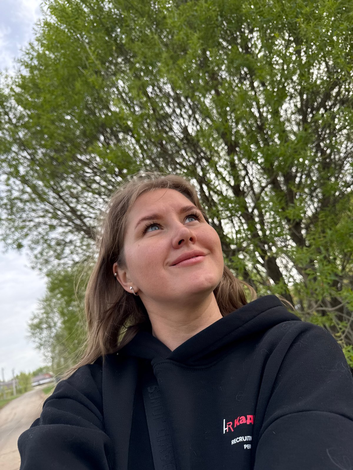 Woman spotted outdoors in Горный, Russia during overcast morning
