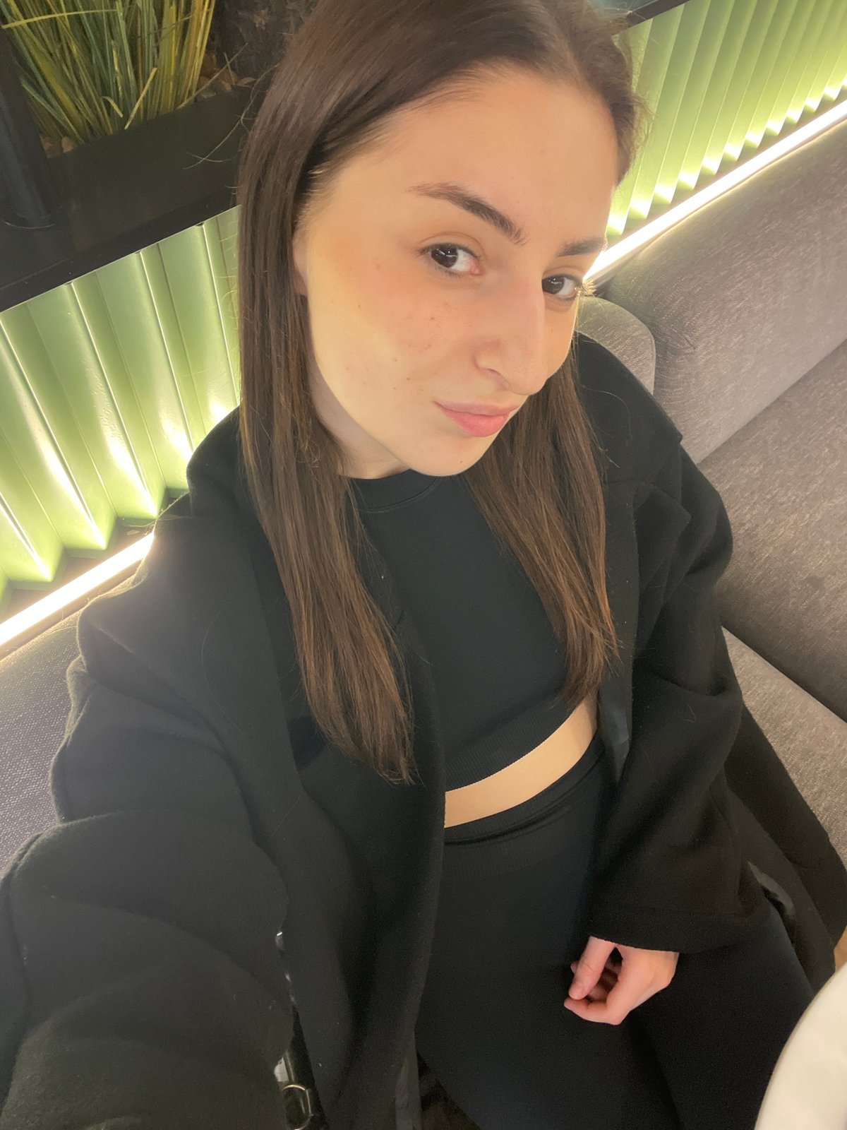Woman takes gym selfies near Victory Day shop in Moscow