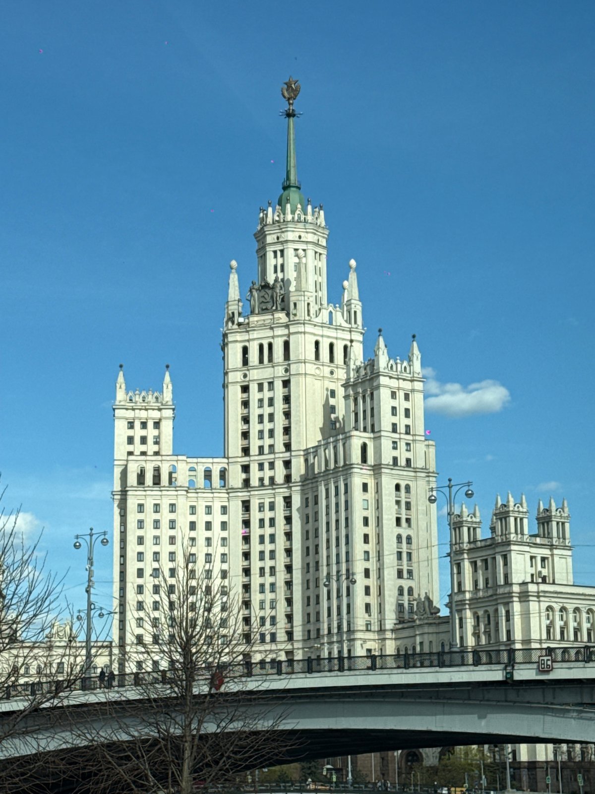 Moscow skyline and Stalinist architecture observed from city bridge