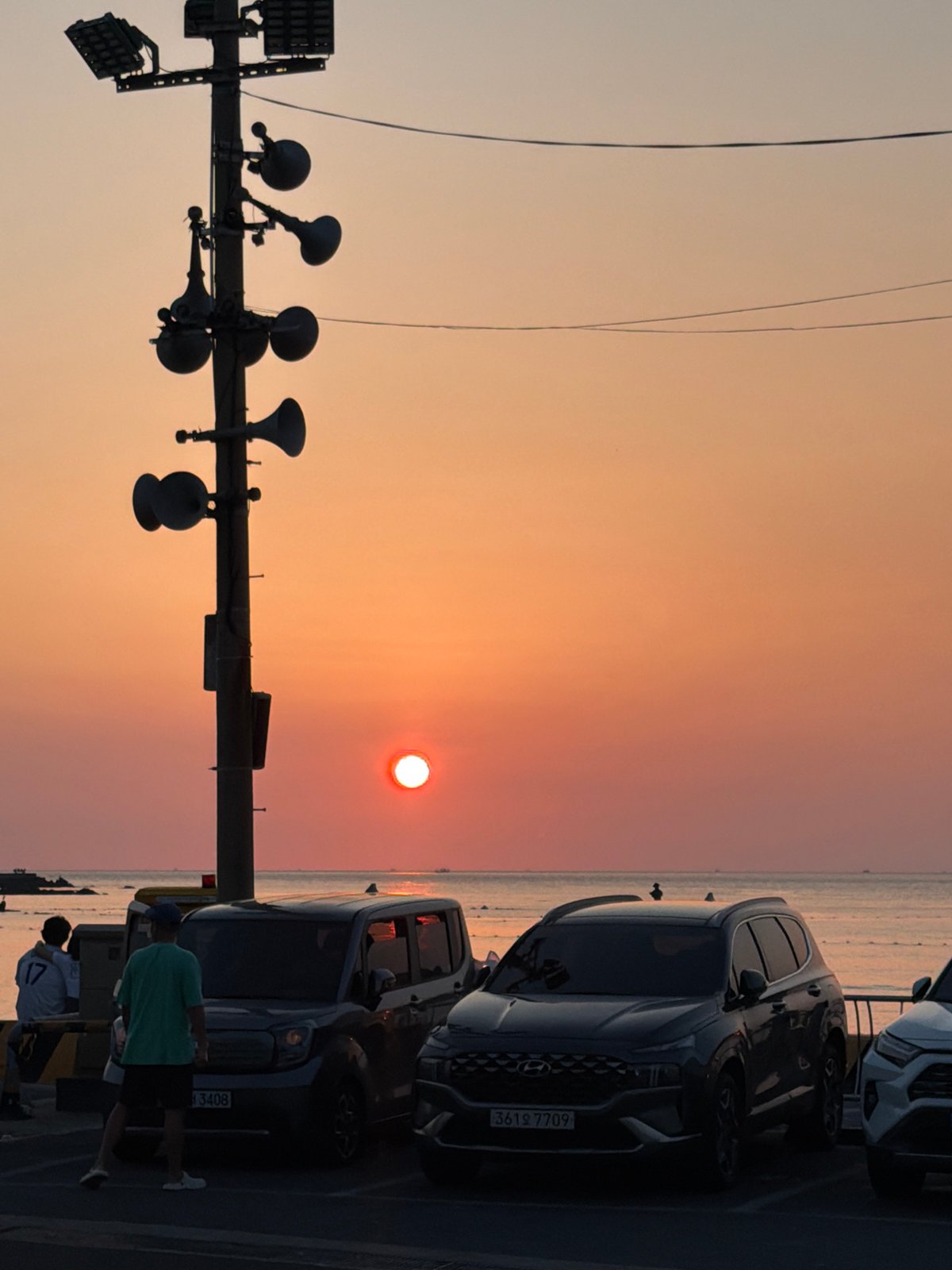 Casual coastal morning at a Jeju beach hangout spot