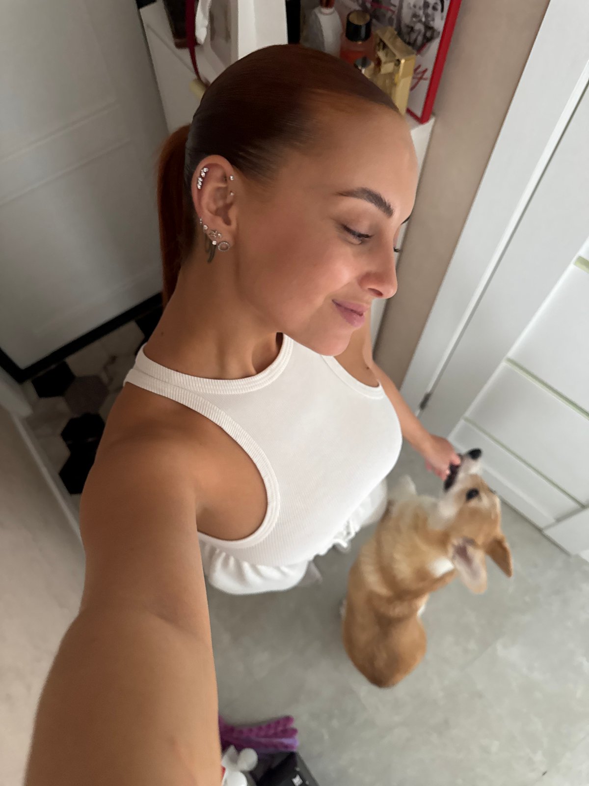 Woman documents morning moments with child, dog in Chaikovsky selfies