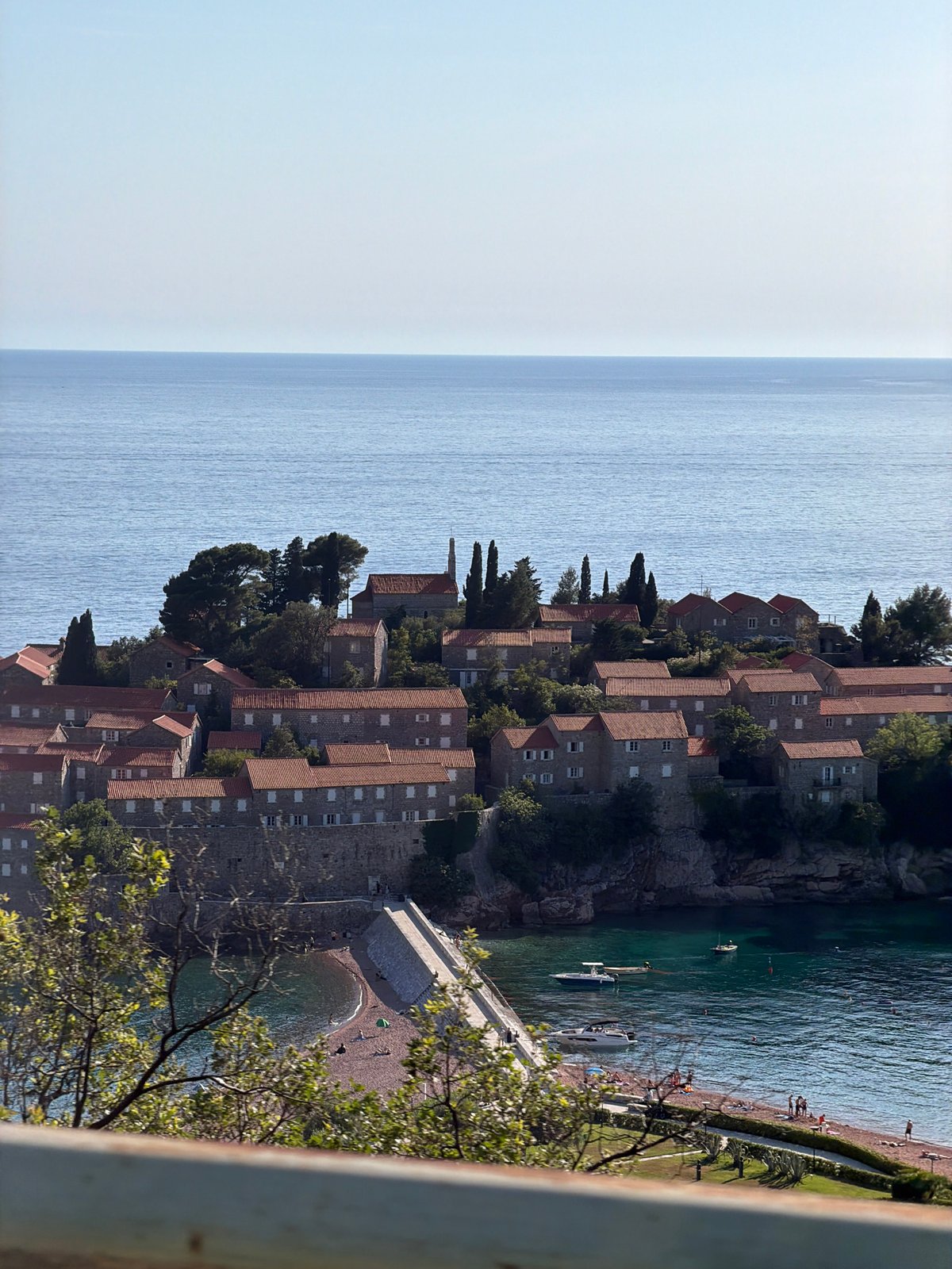 Tourist documents Montenegro's Sveti Stefan and Pržno coastal views
